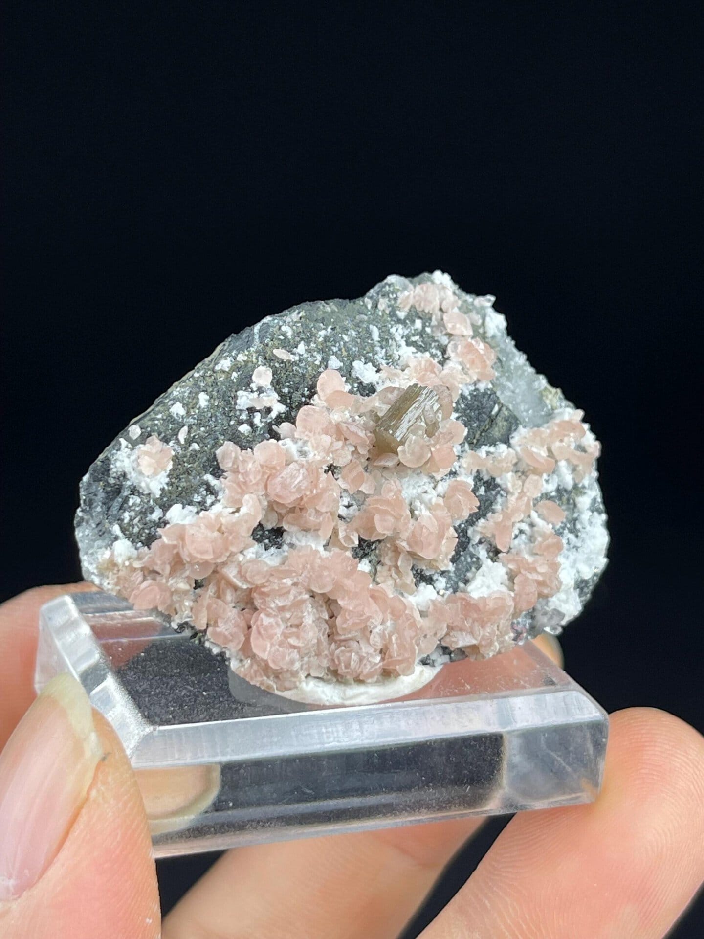 White snowflake-like crystalline base of rhodochrosite