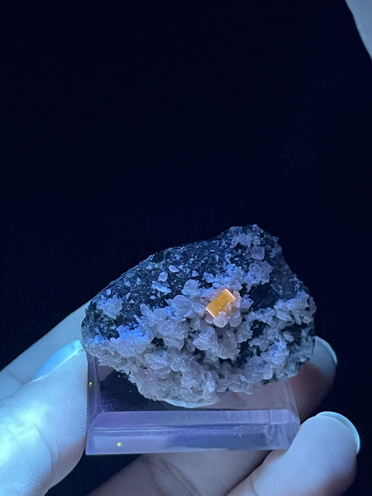 Vitreous luster on pink rhodochrosite surfaces