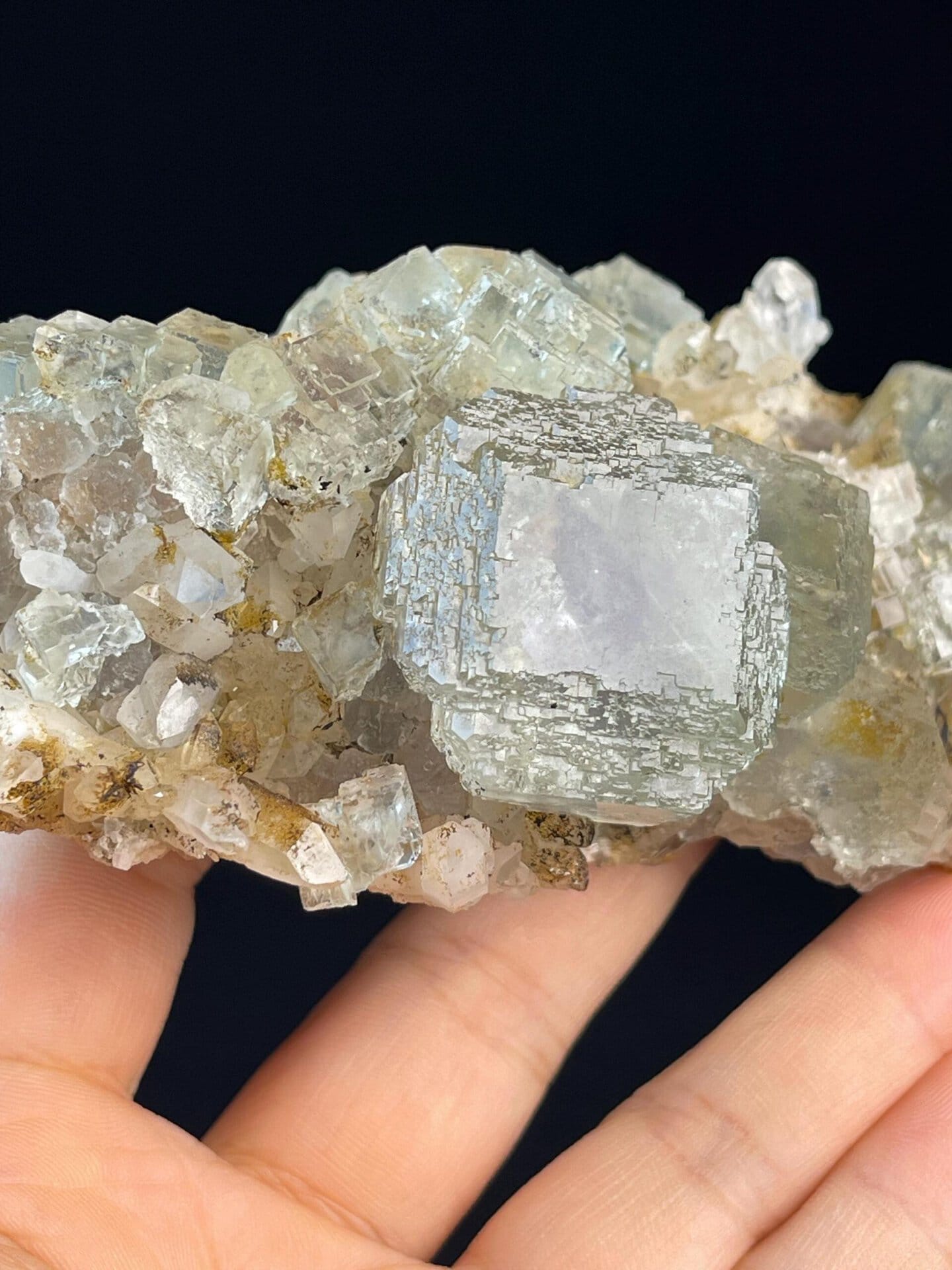 Side profile of step-cut fluorite showing layered growth