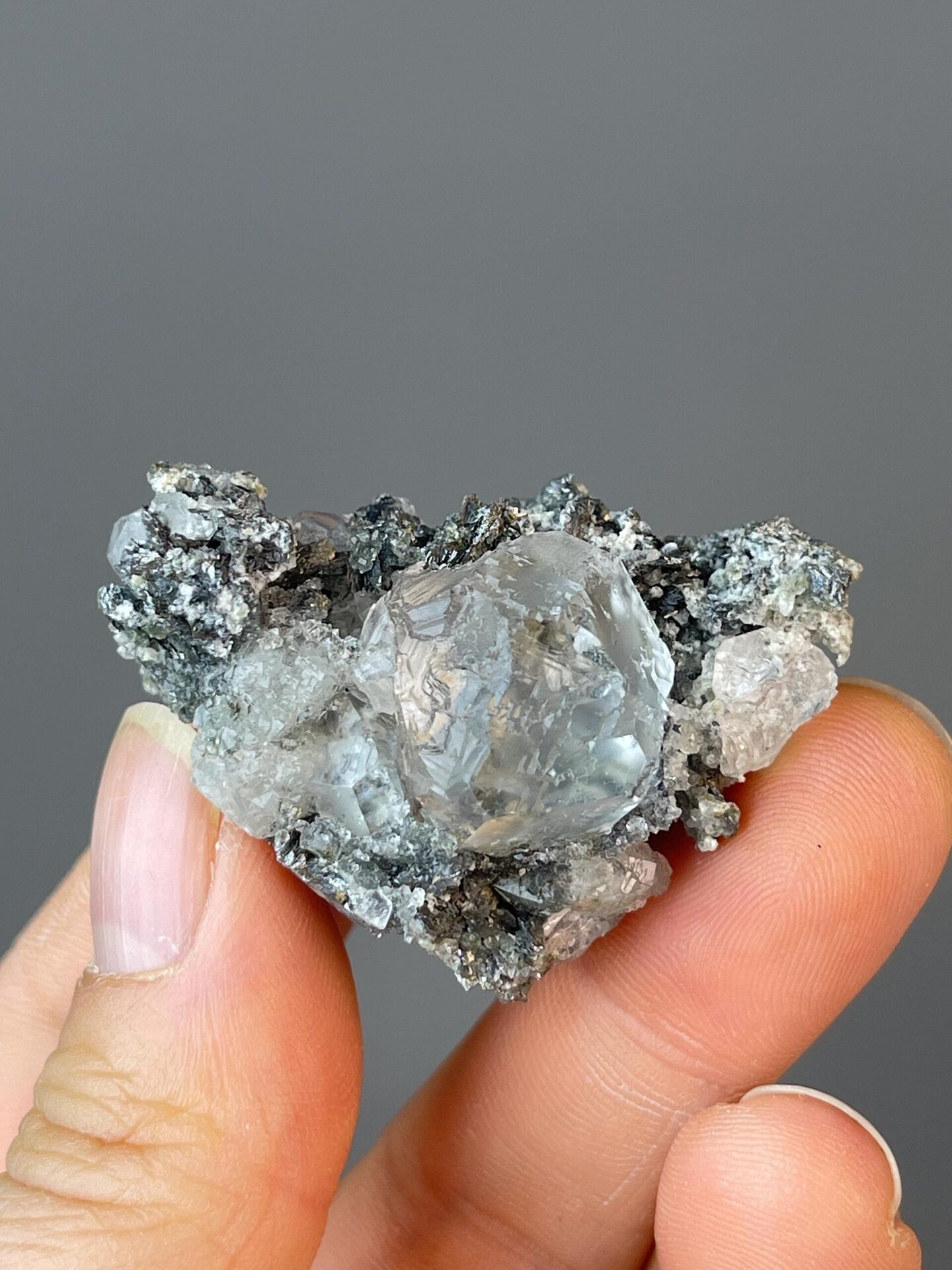 Close-up of white fluorite sphere showing clarity