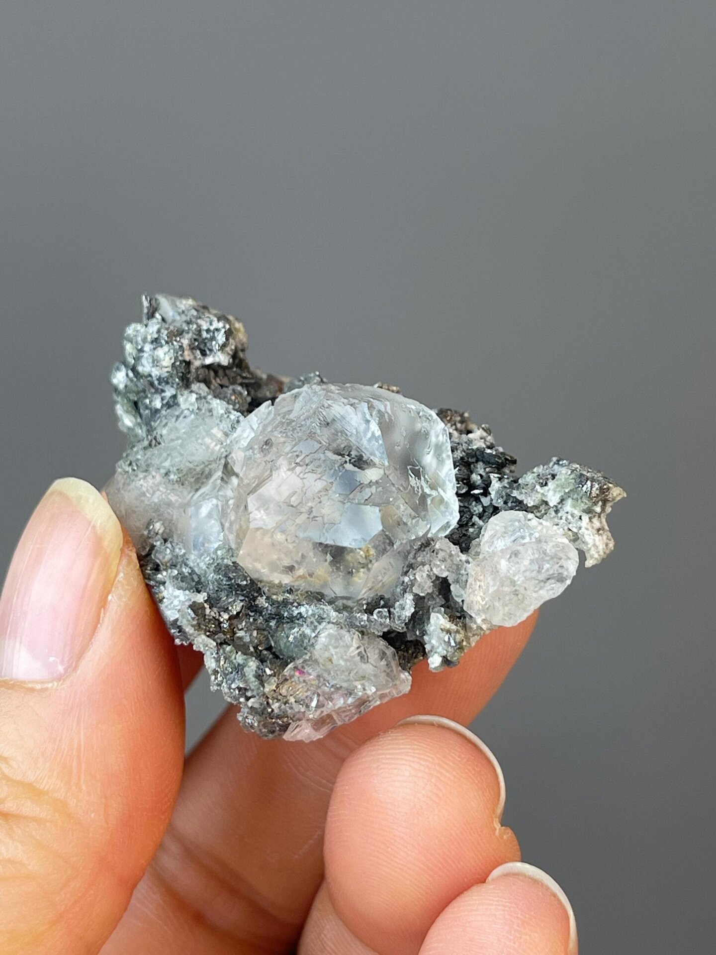 Back view of white fluorite sphere