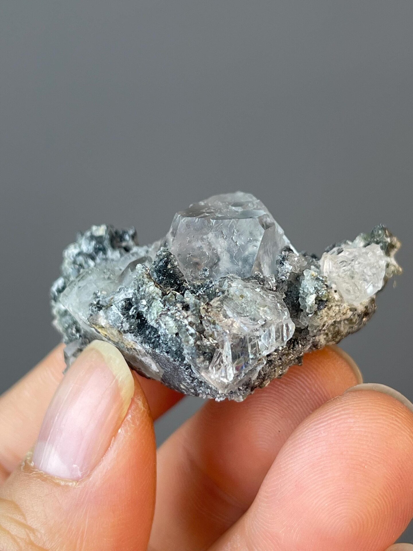 Vitreous luster on polished fluorite sphere surface