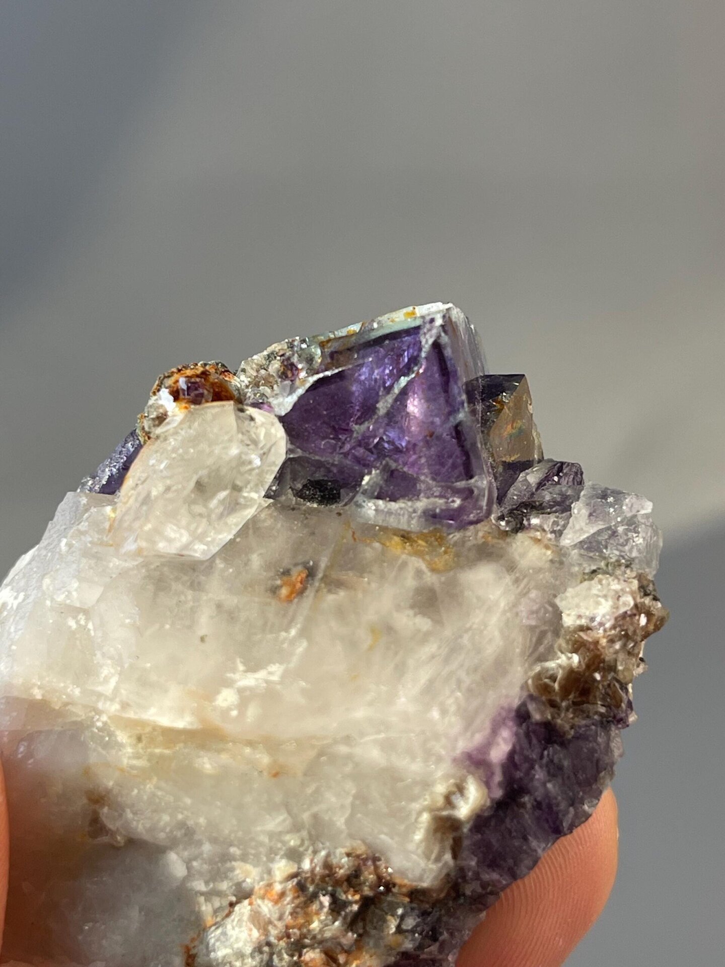 Vitreous luster on deep purple fluorite faces