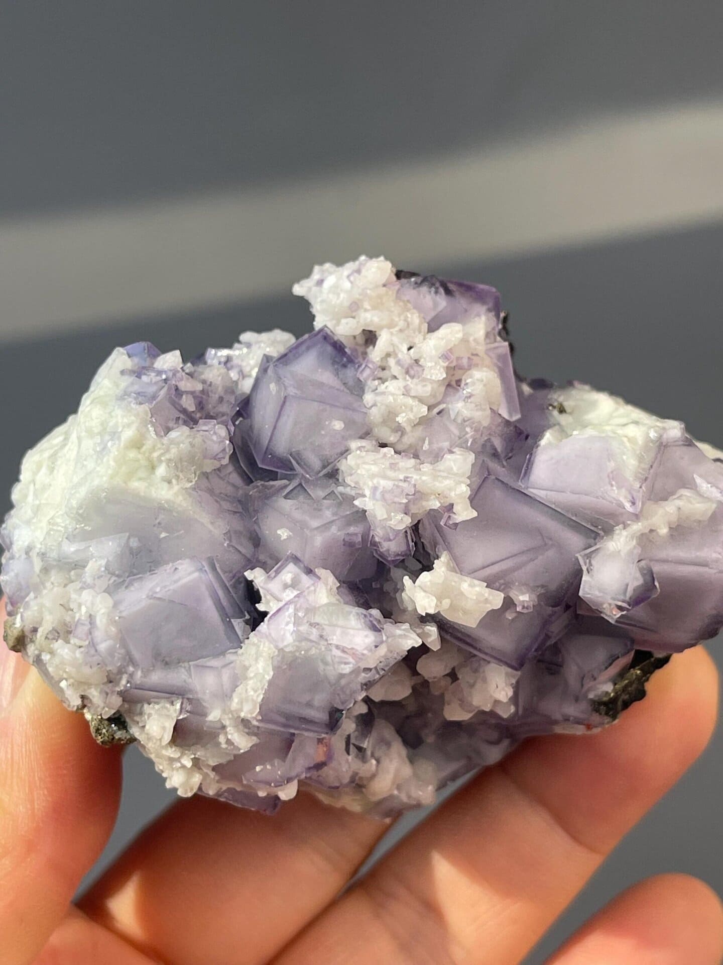 Back view of purple fluorite crystal specimen