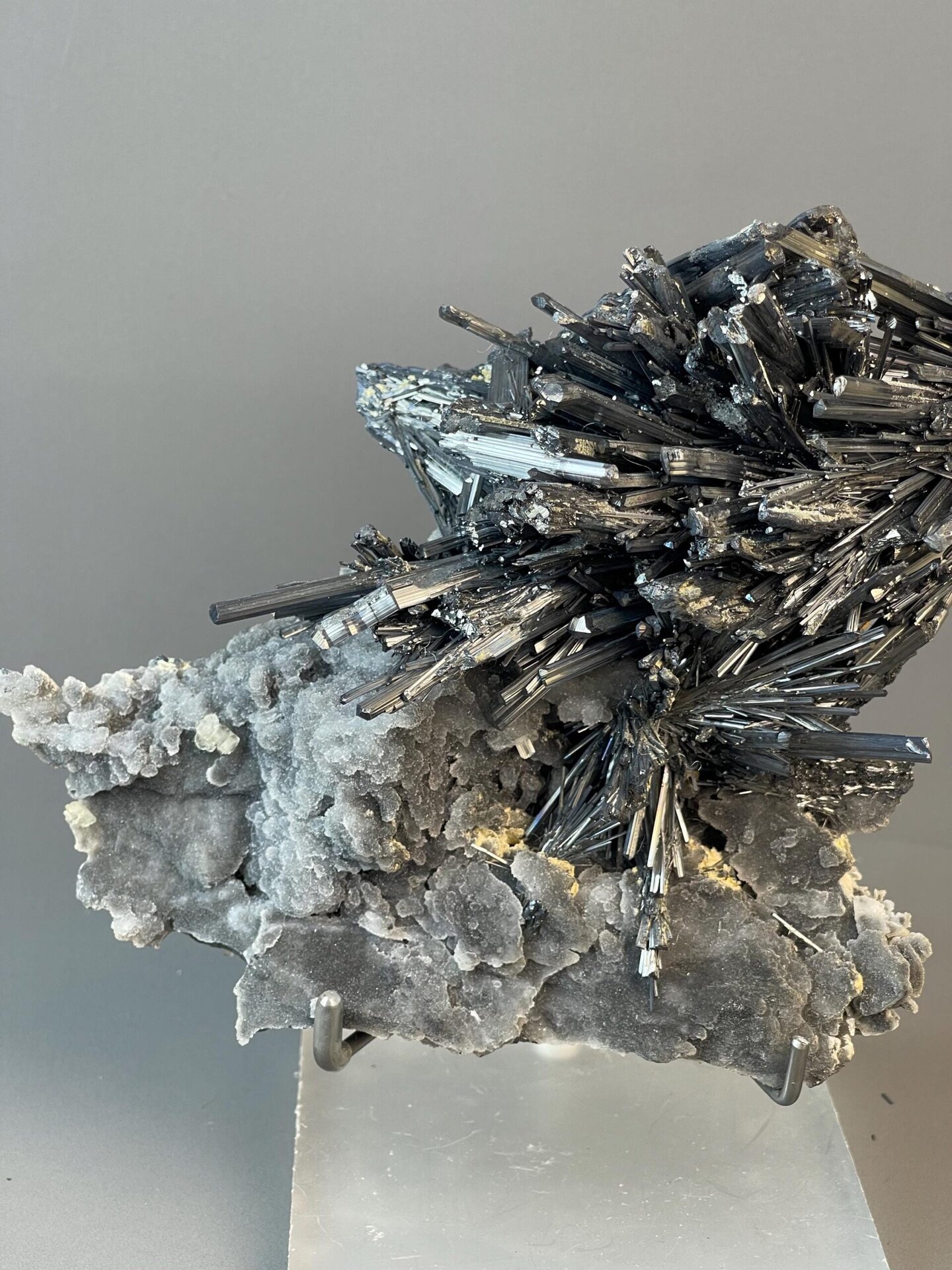Back view of large stibnite crystal cluster