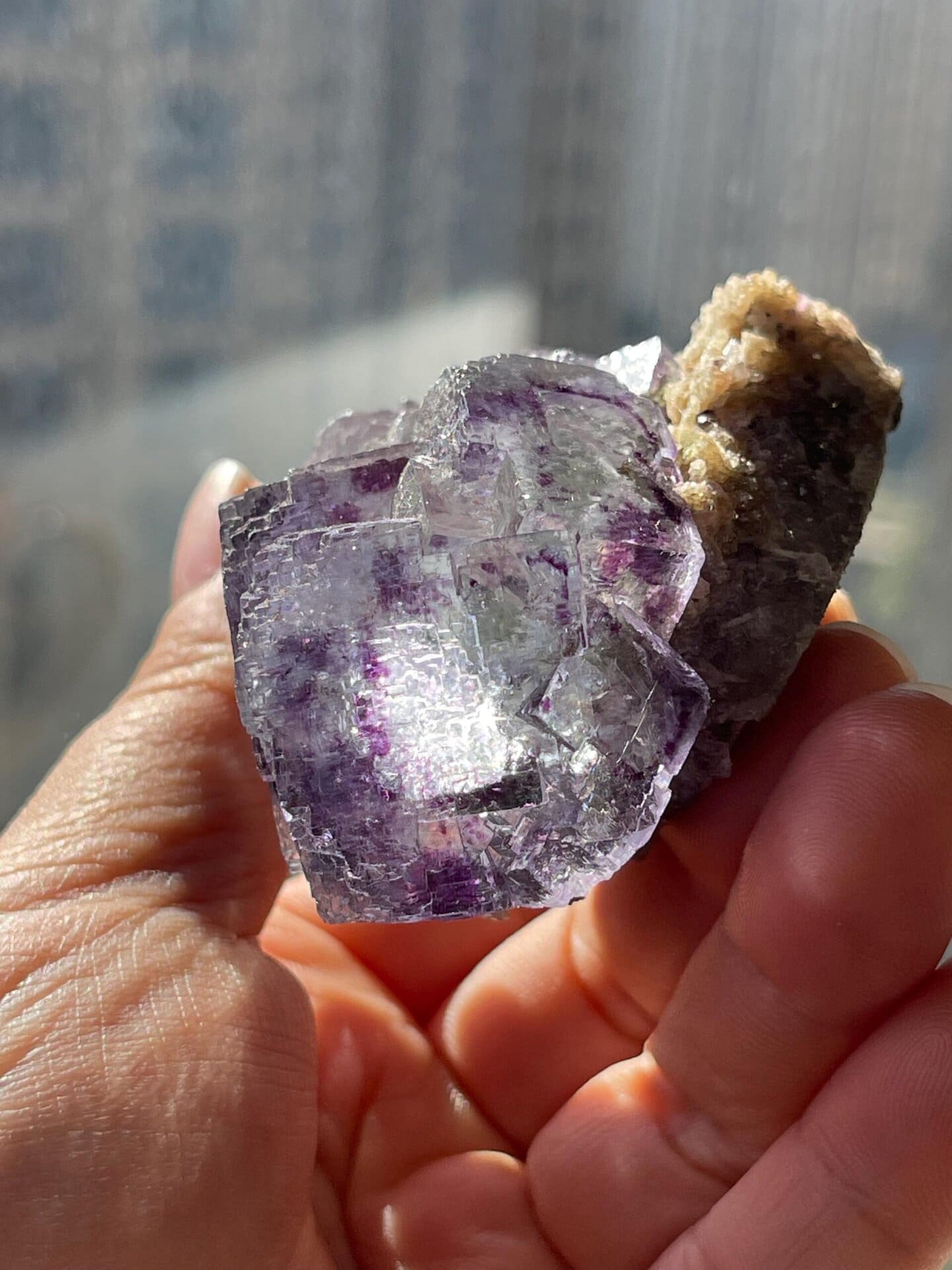 Stepped fluorite specimen under studio lighting