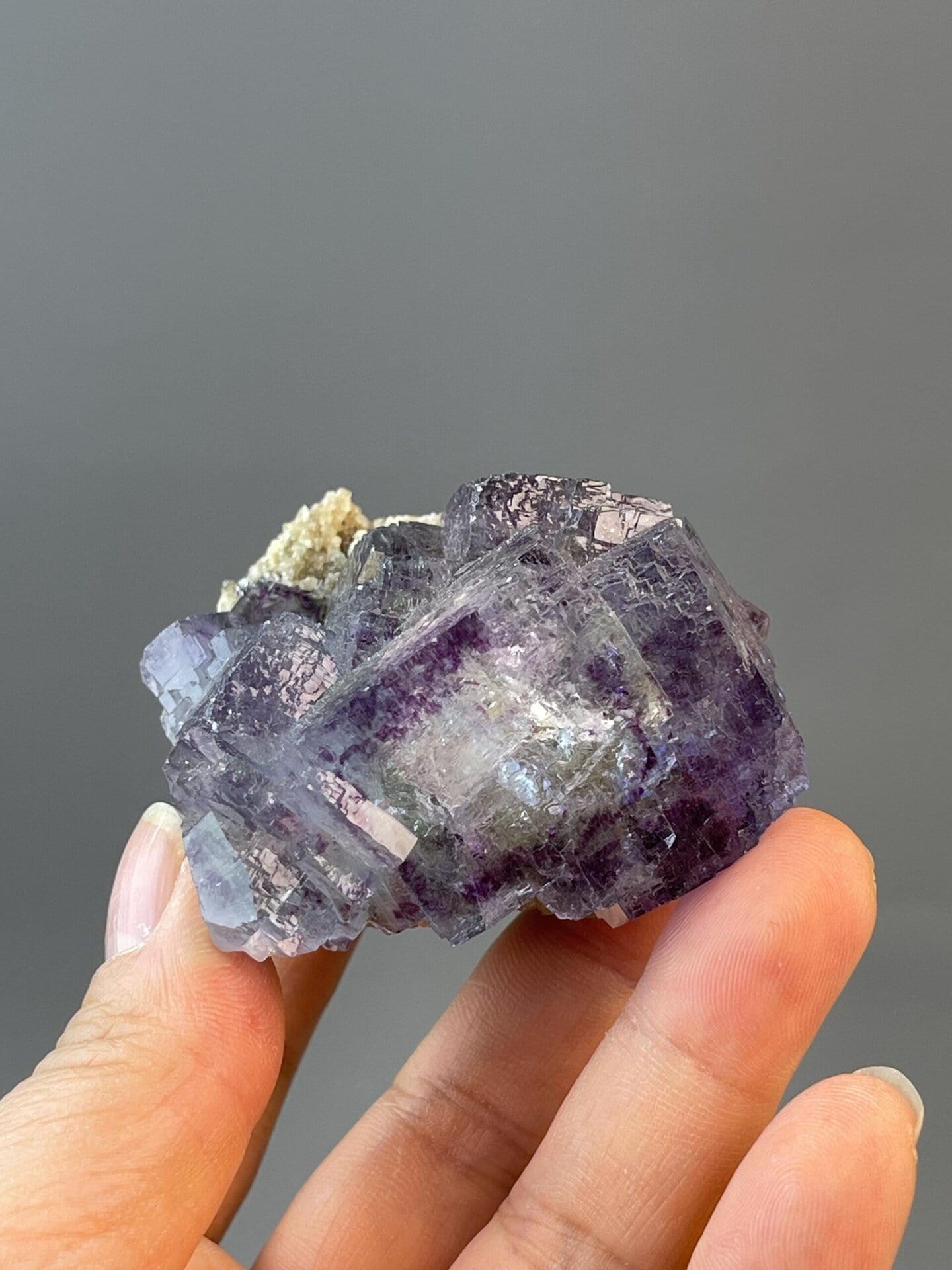 Scale reference of purple-blue stepped fluorite specimen