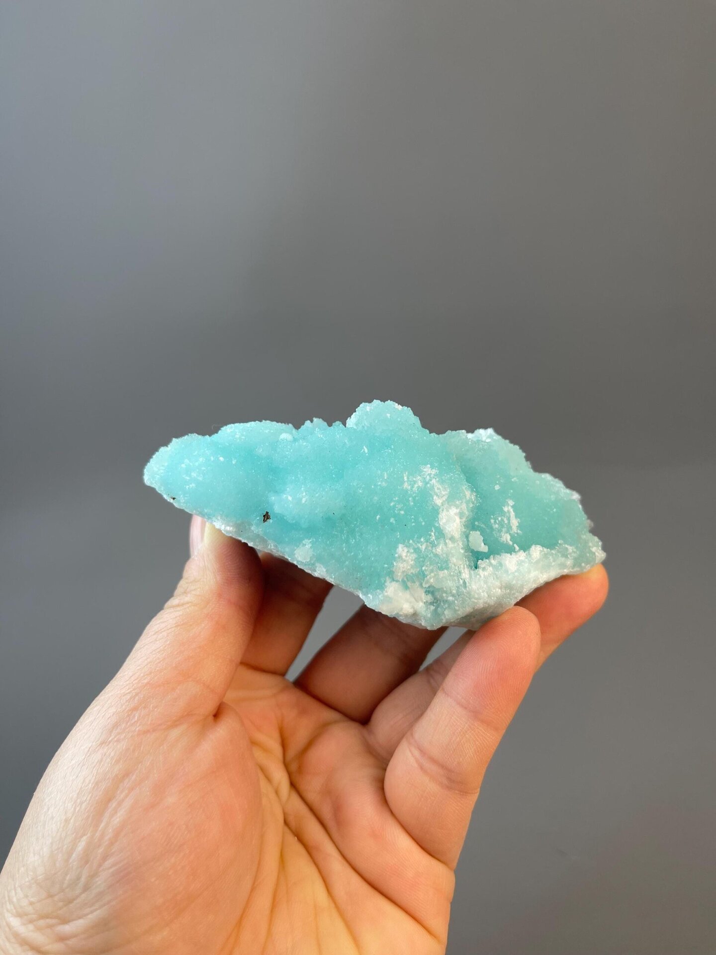 Top view of azurite cloud with white mineral inclusions