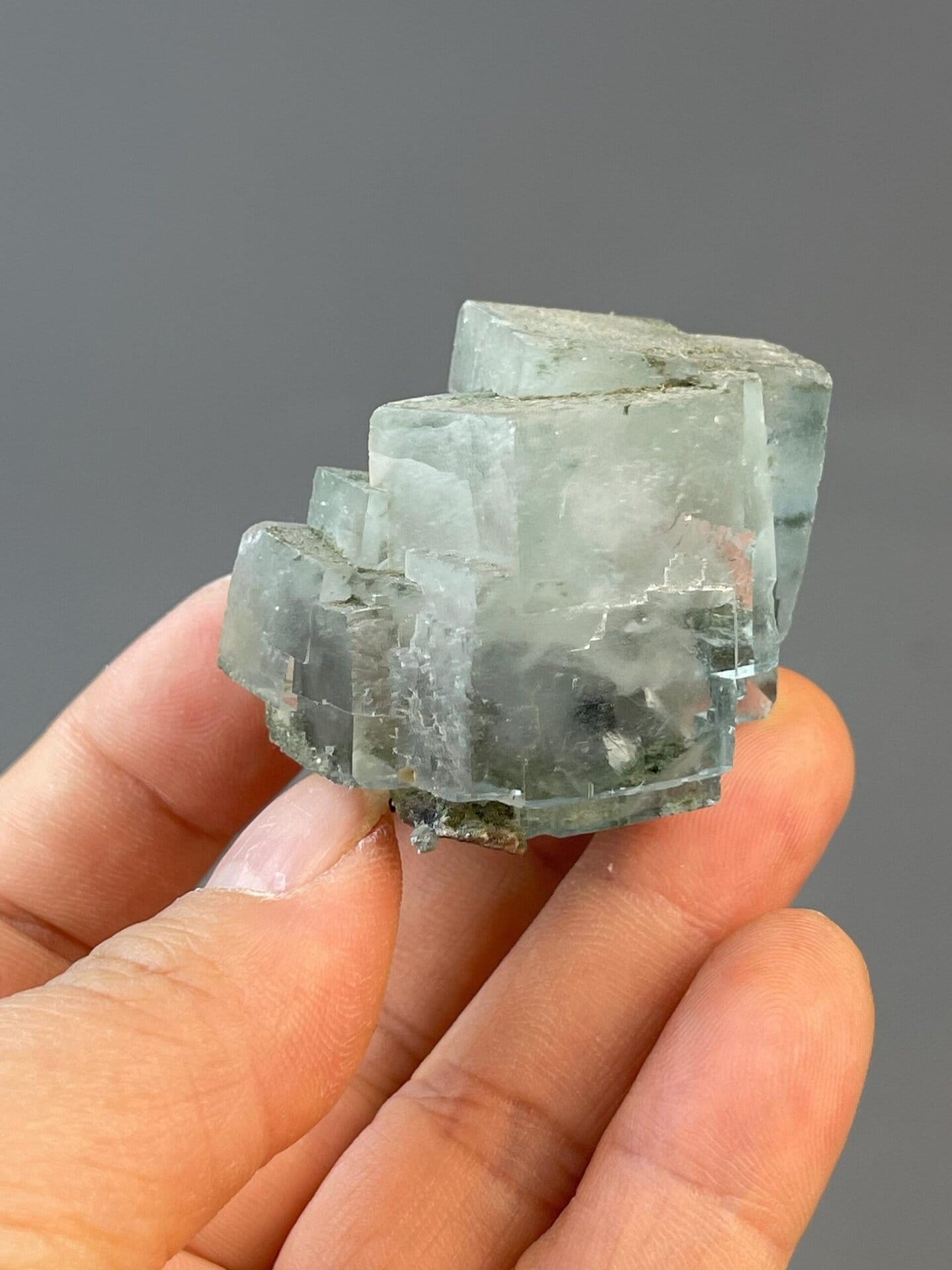 Vitreous luster on light green fluorite twin faces
