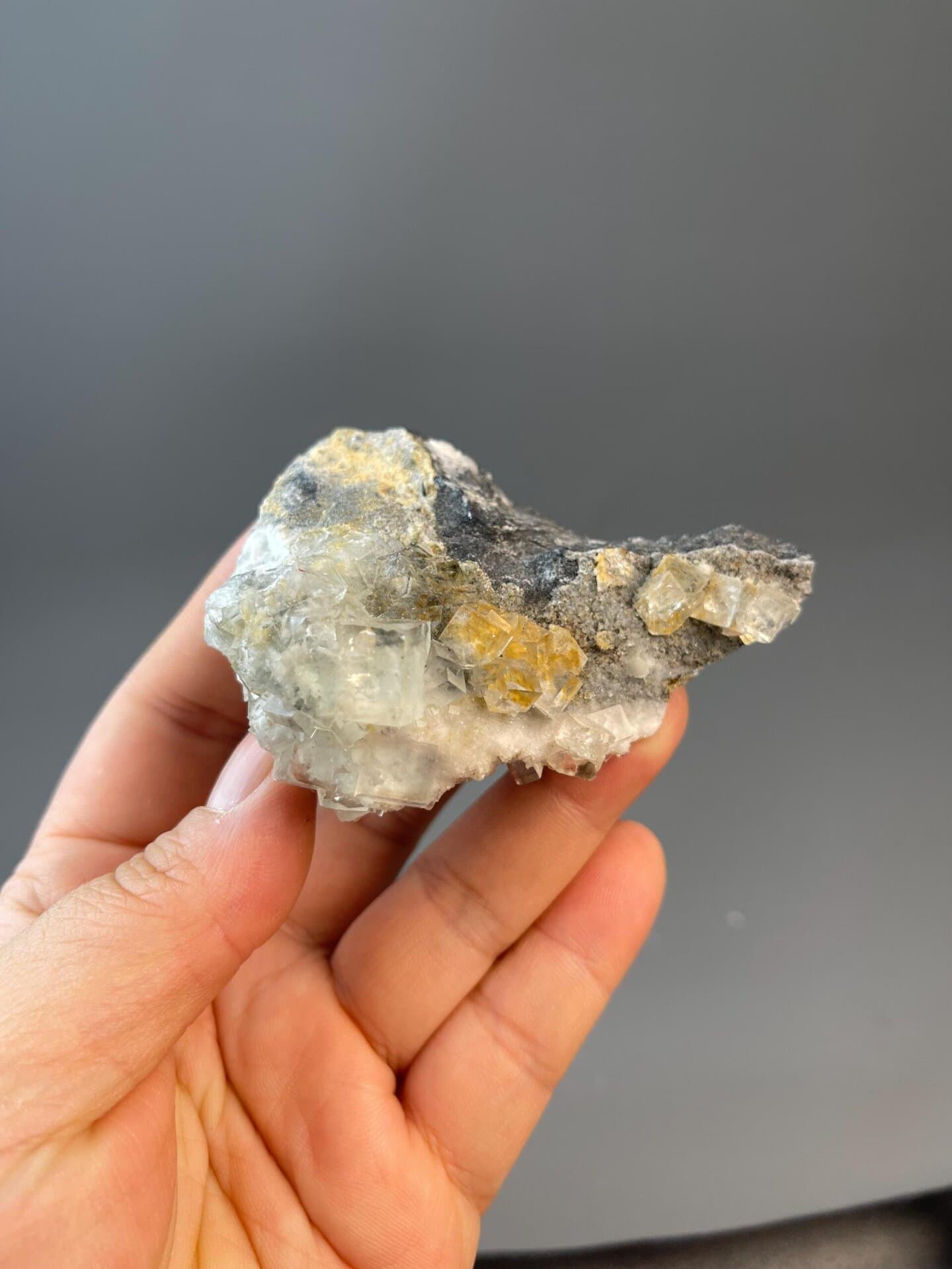 Back view of fluorite cube and matrix specimen