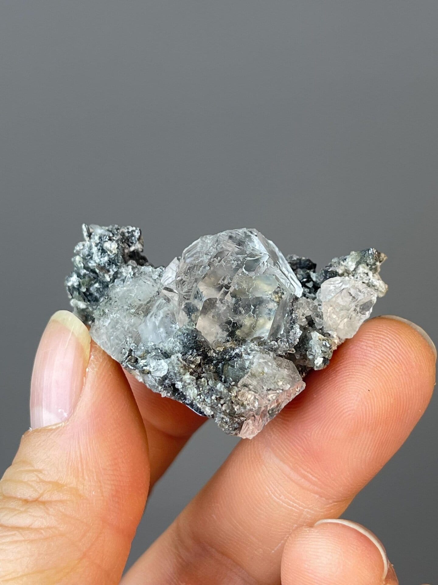 Front view of transparent white fluorite sphere