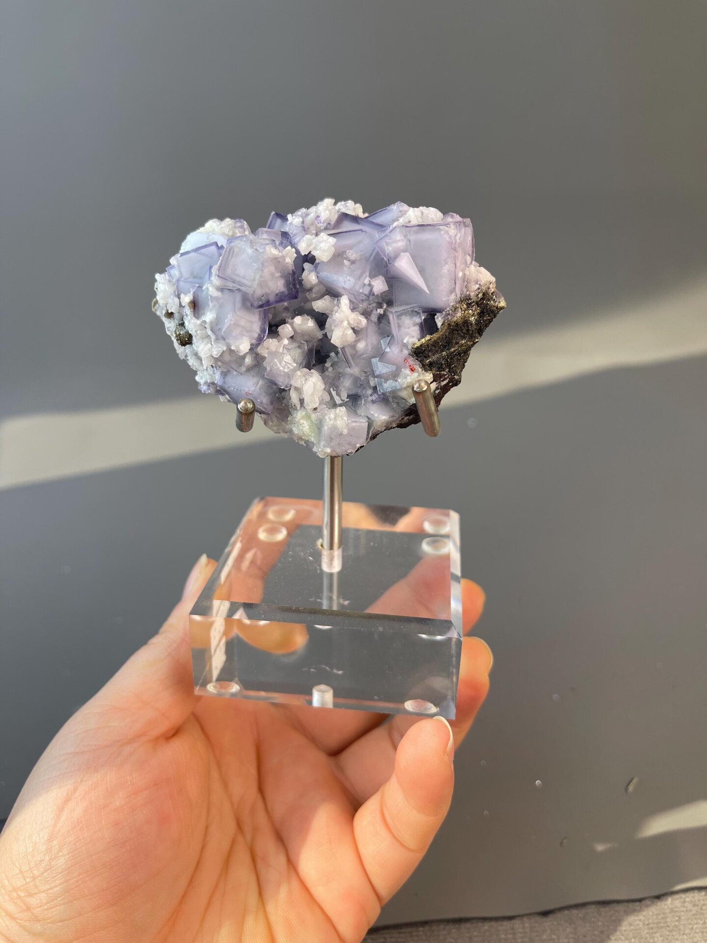Side view of purple fluorite crystal specimen
