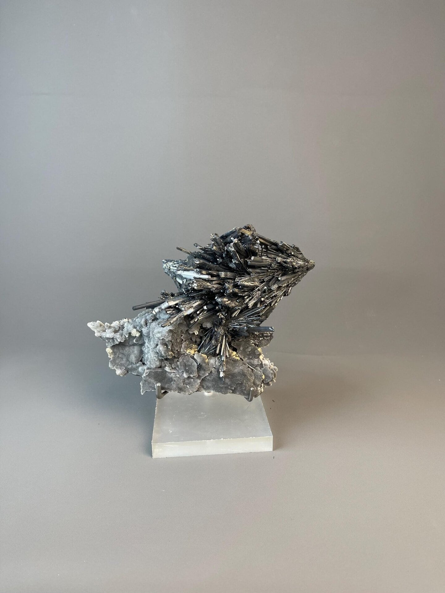 Close-up of elongated metallic stibnite crystal blades