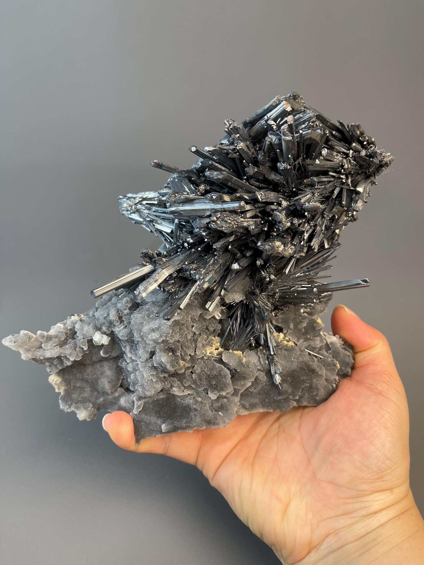 Scale reference of large 8-inch stibnite formation