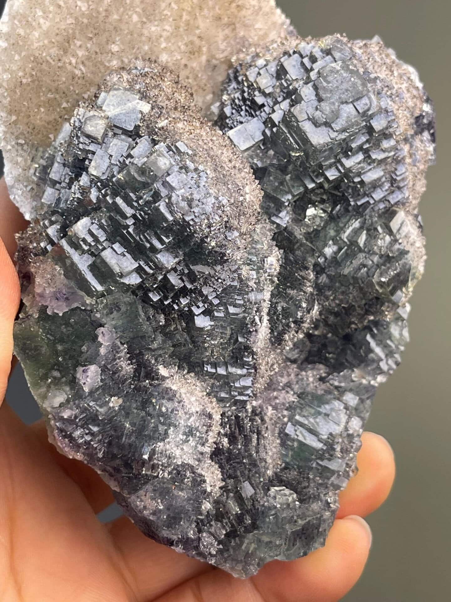 Natural green fluorite spheres on contrasting quartz matrix