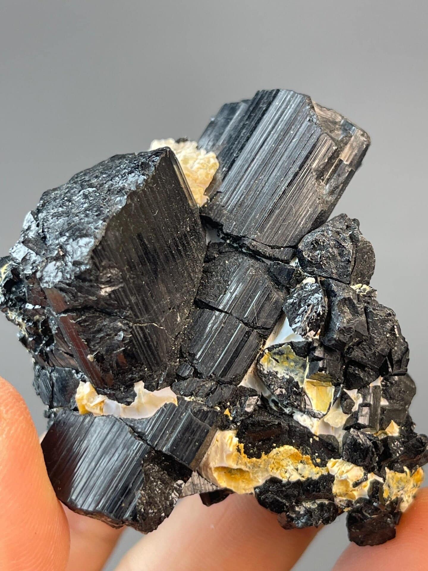 Schorl tourmaline crystals crossing in natural X formation