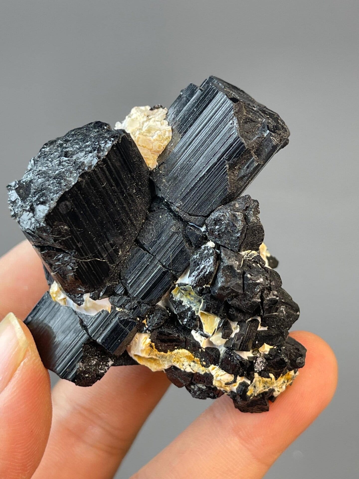Tourmaline X-shaped cluster with vitreous to resinous luster