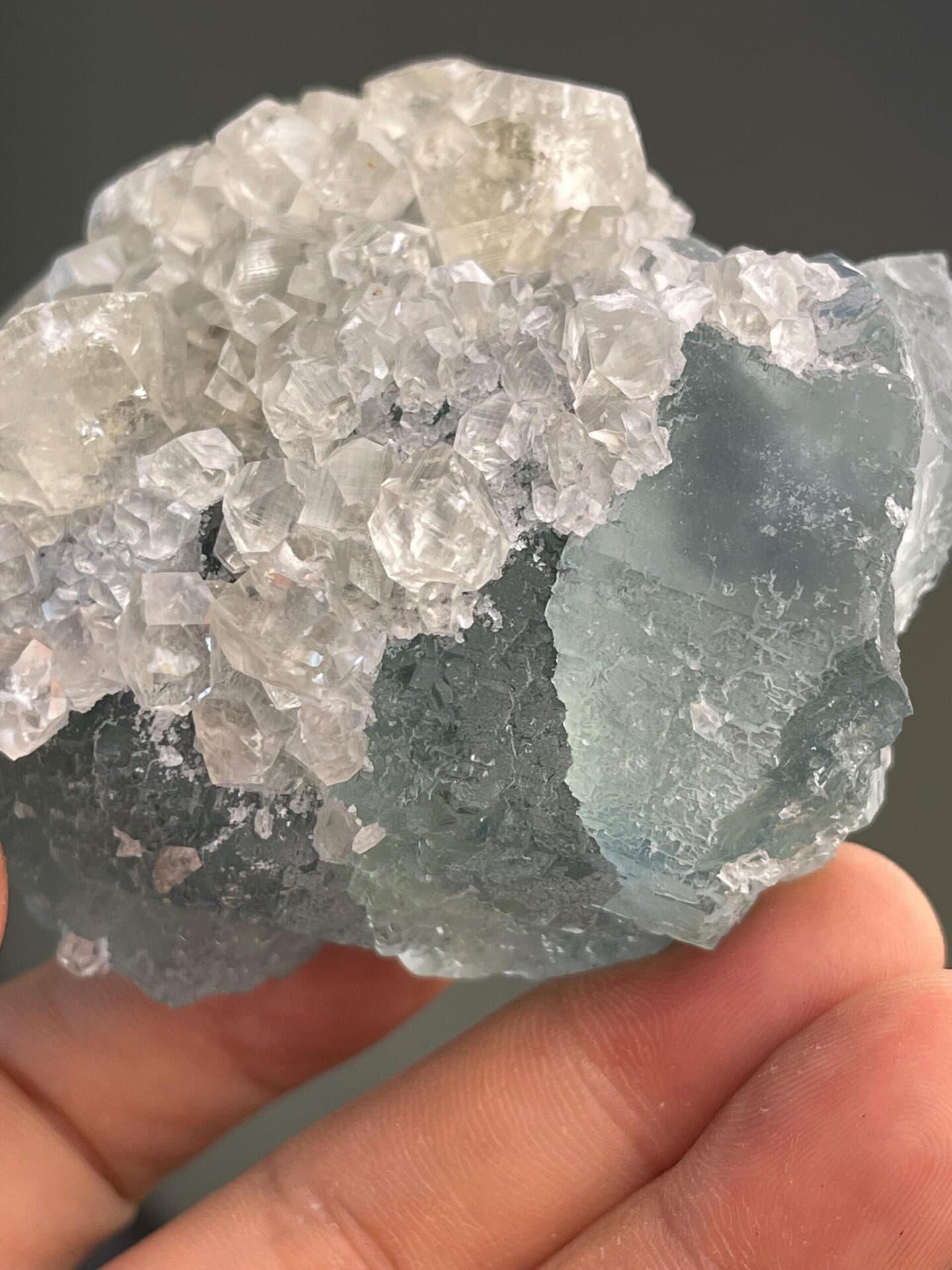 Interlocking green fluorite and white calcite in floral pattern