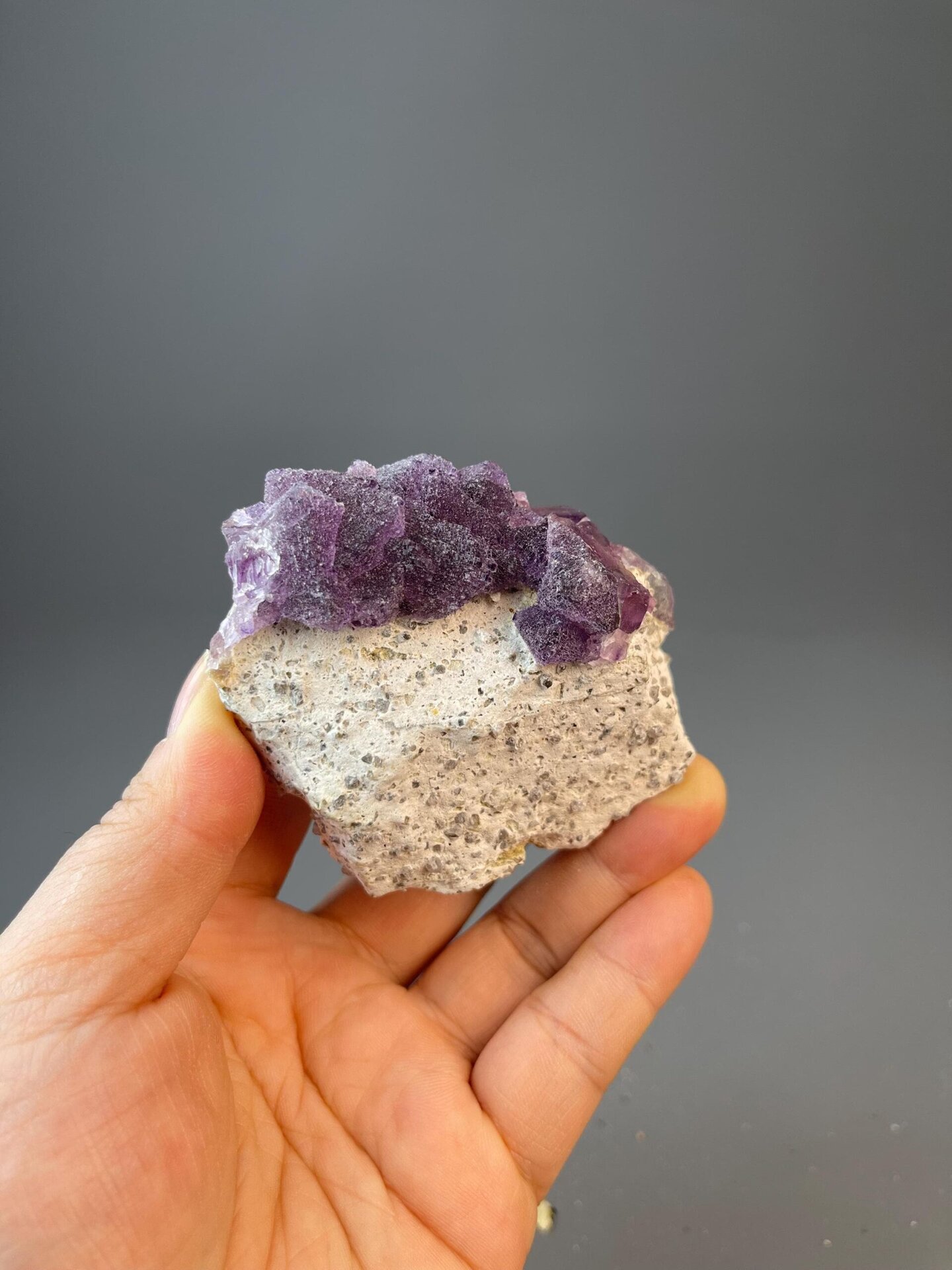Deep violet fluorite octahedron cluster with mountainous form