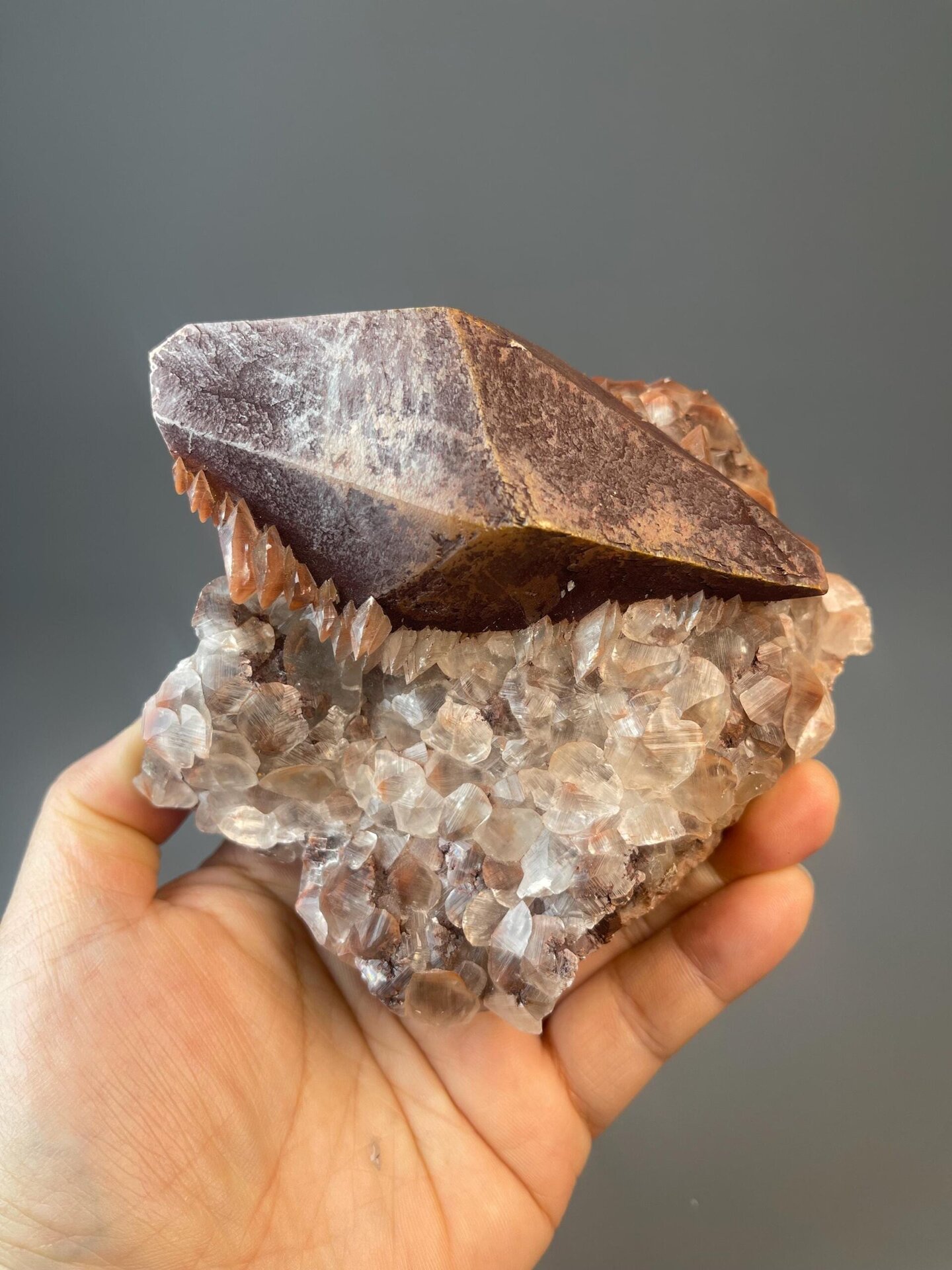 CaCO₃ trigonal calcite with deep red iron oxide coloration