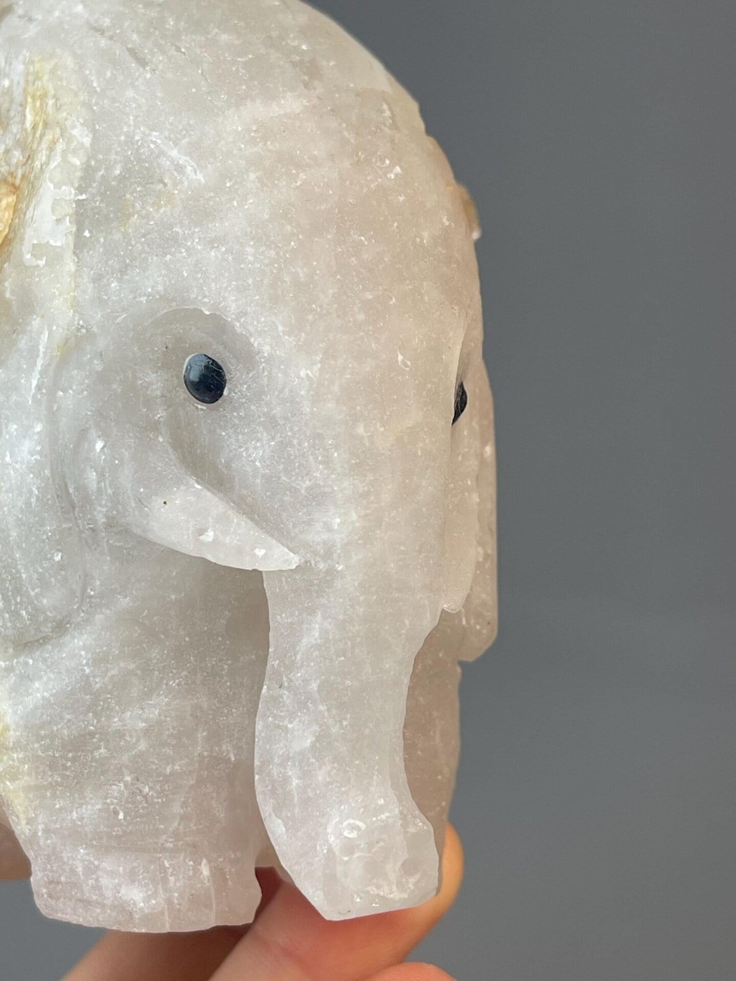 Large carved quartz elephant measuring 4.1×4.0×2.5 inches