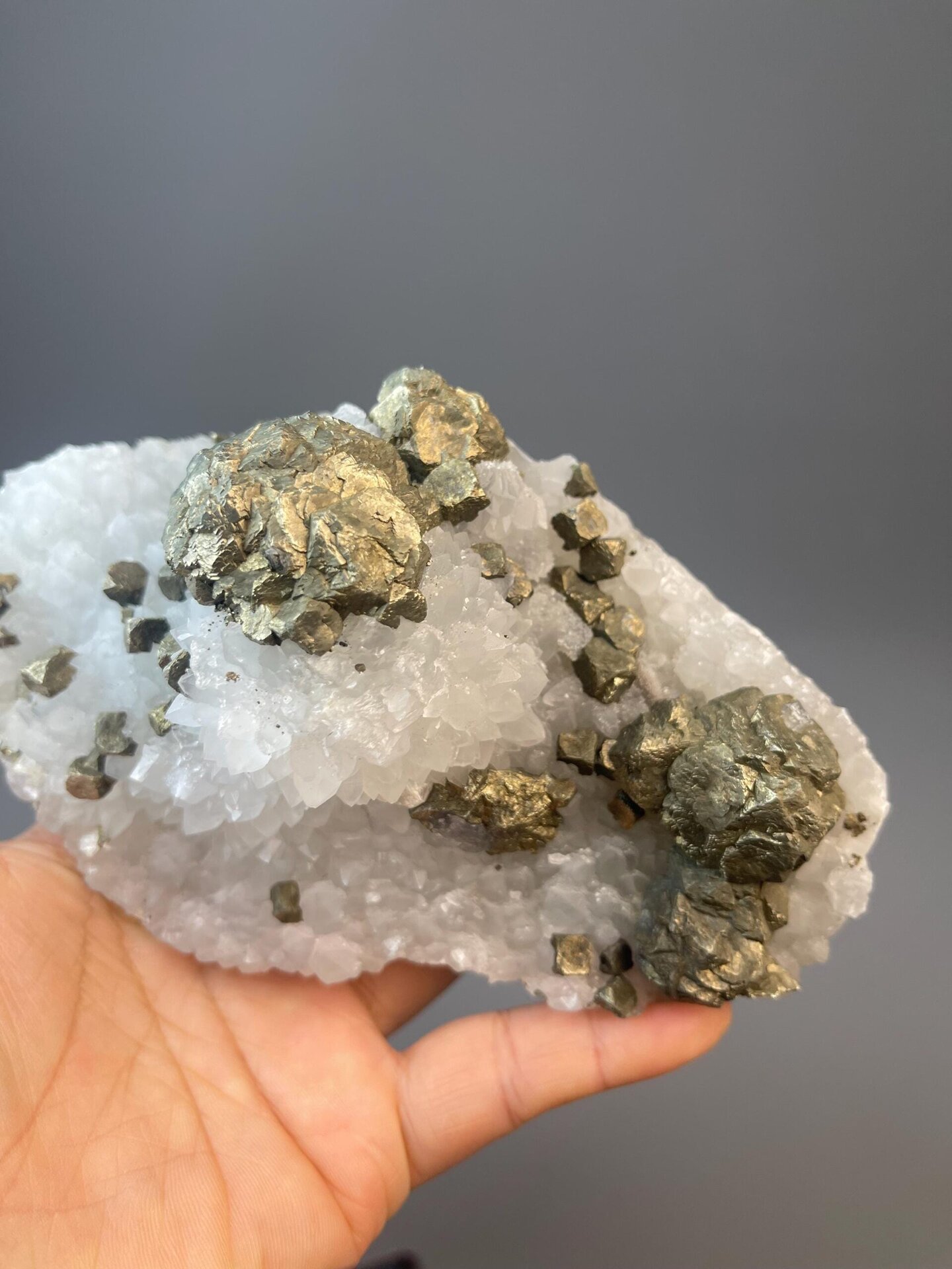 Globular chalcopyrite mass with brassy and rainbow iridescence