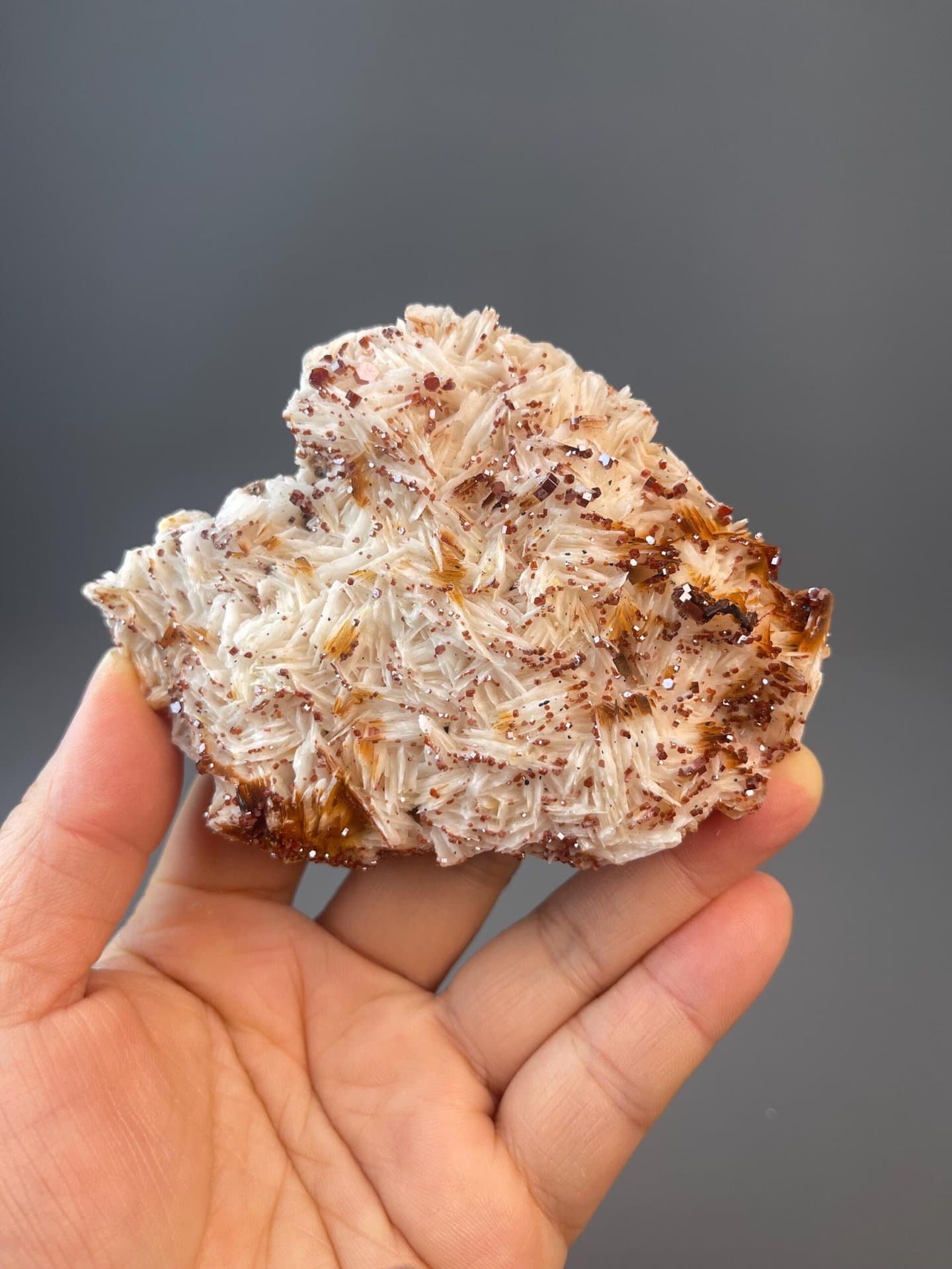 Red vanadinite hexagonal crystals on contrasting yellow matrix