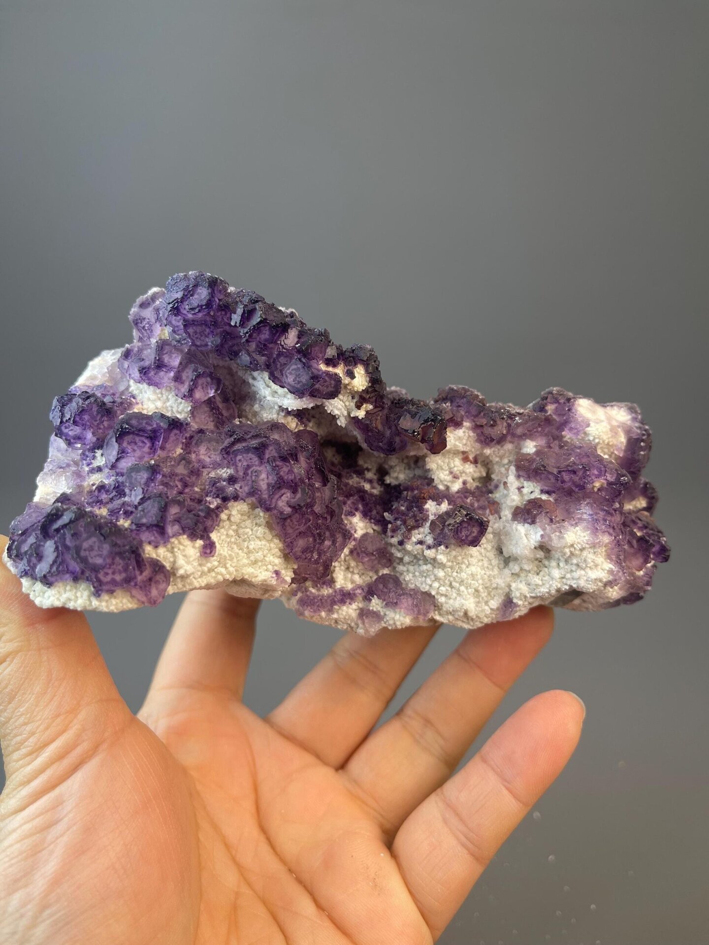 Fan-shaped fluorite specimen measuring 5.5×3.0×2.5 inches