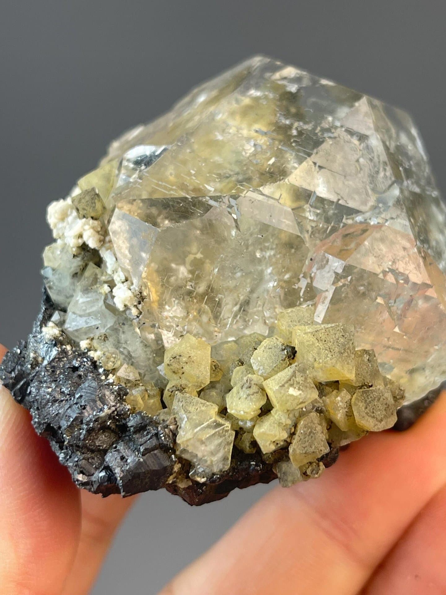 Inner Mongolia fluorite sphere with SnO₂ cassiterite specks