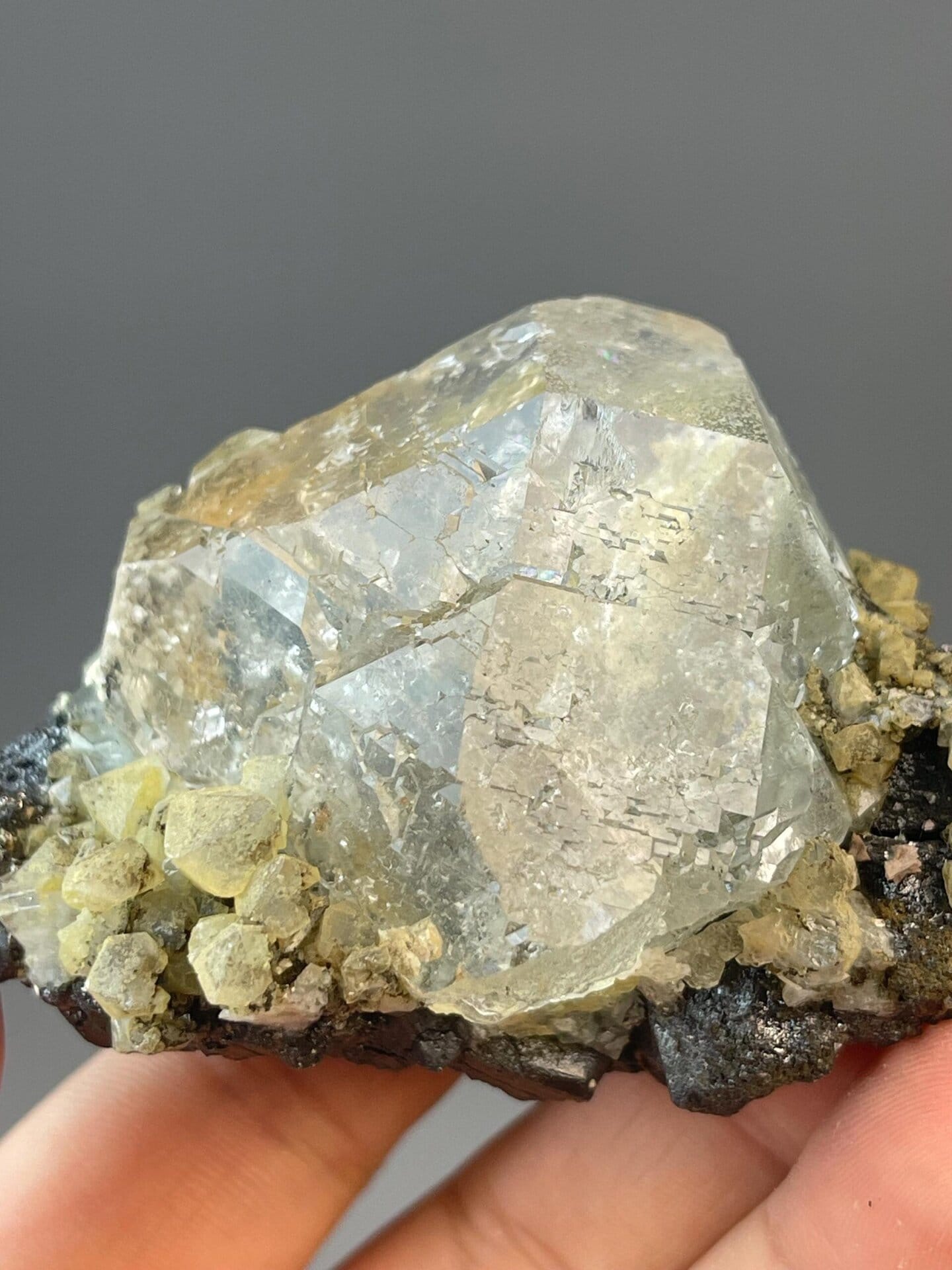 Collector white fluorite sphere from Inner Mongolia with cassiterite
