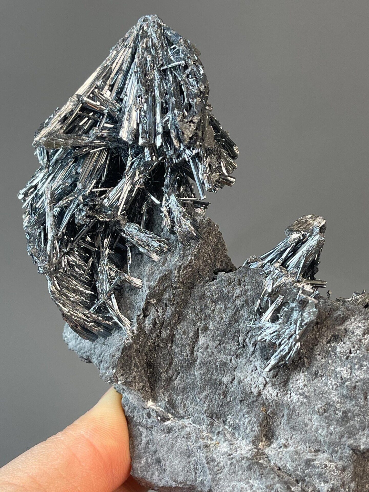 Rock matrix base of stibnite crystal specimen