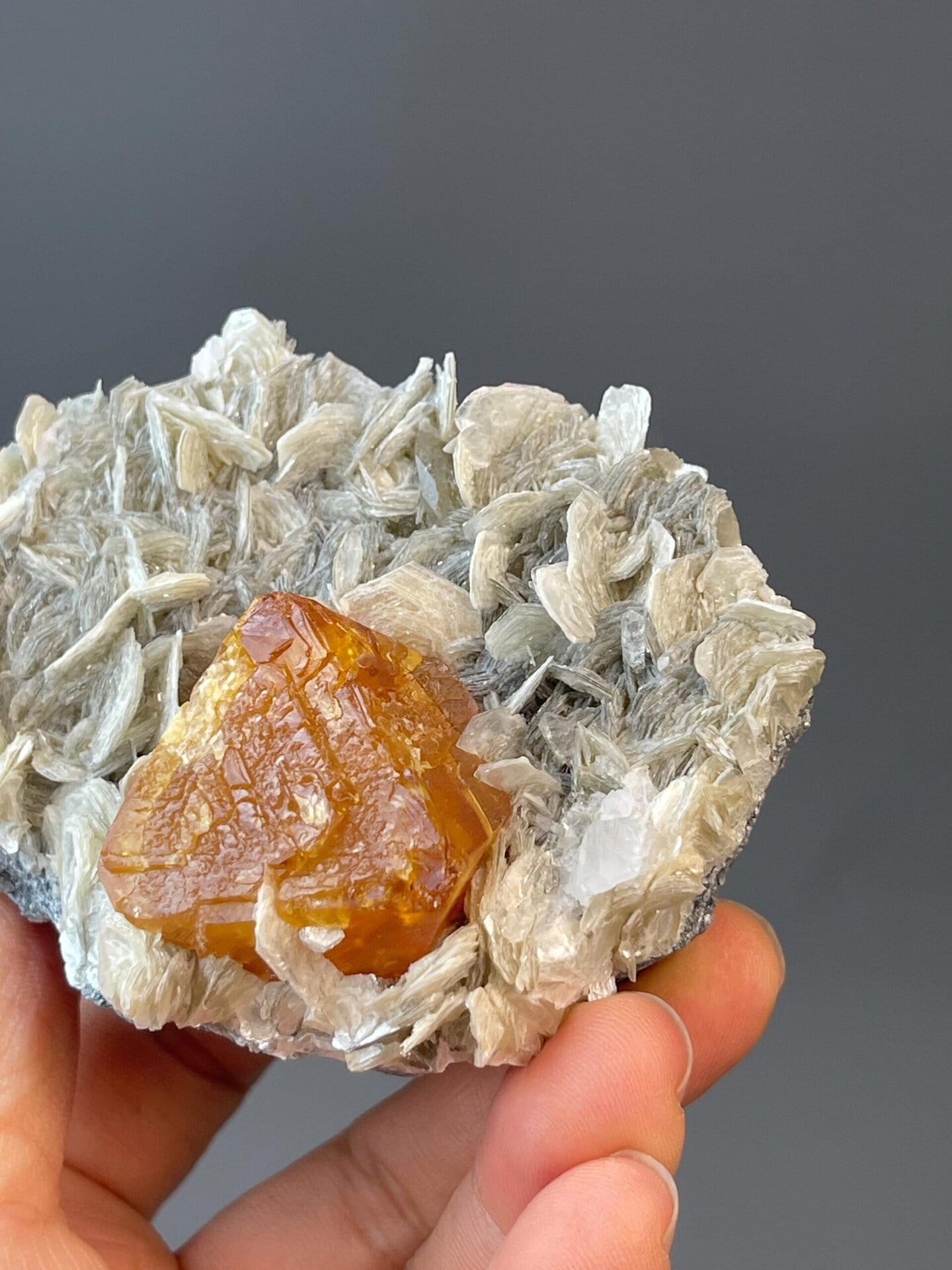 Vibrant orange scheelite adamantine luster detail