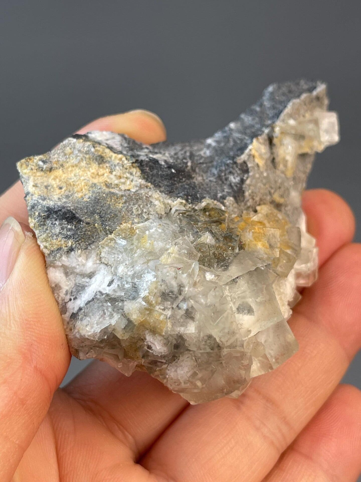 Xianghualing fluorite cube under studio lighting