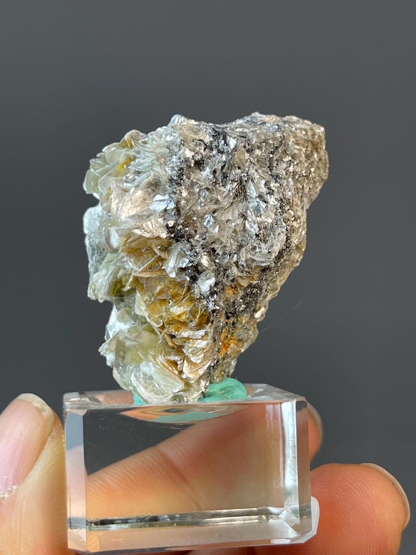 Sichuan cassiterite crystal with associated mica blades
