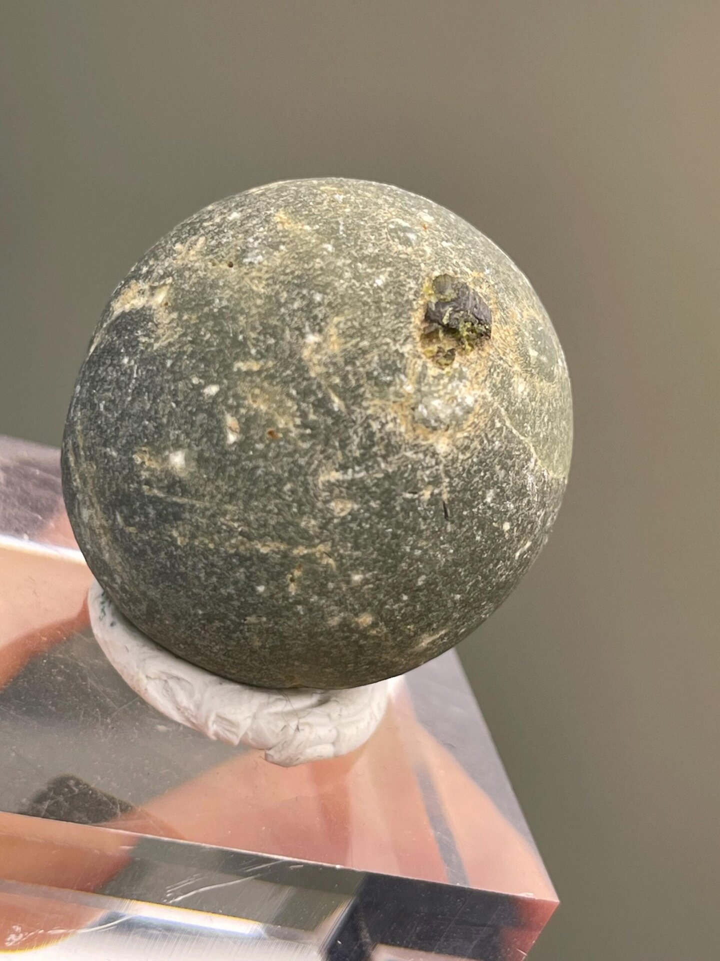 Angled view of small prehnite botryoidal cluster