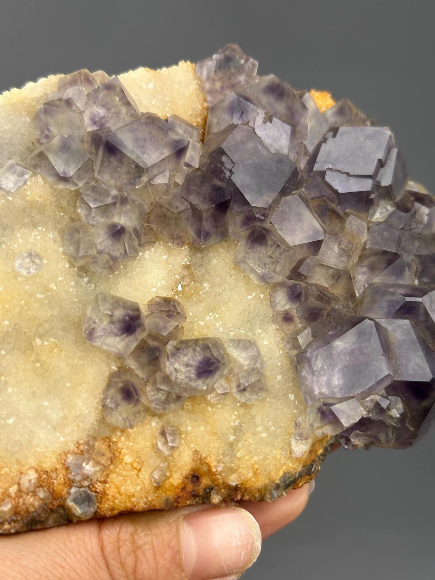Backlit large purple fluorite slab translucency