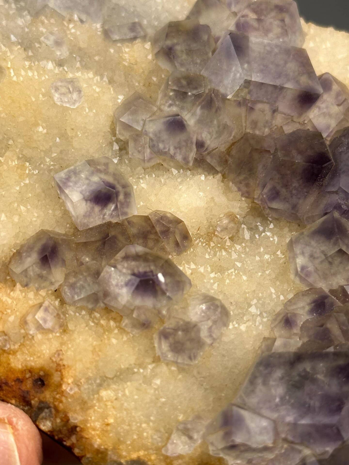 Angled view of large purple fluorite slab