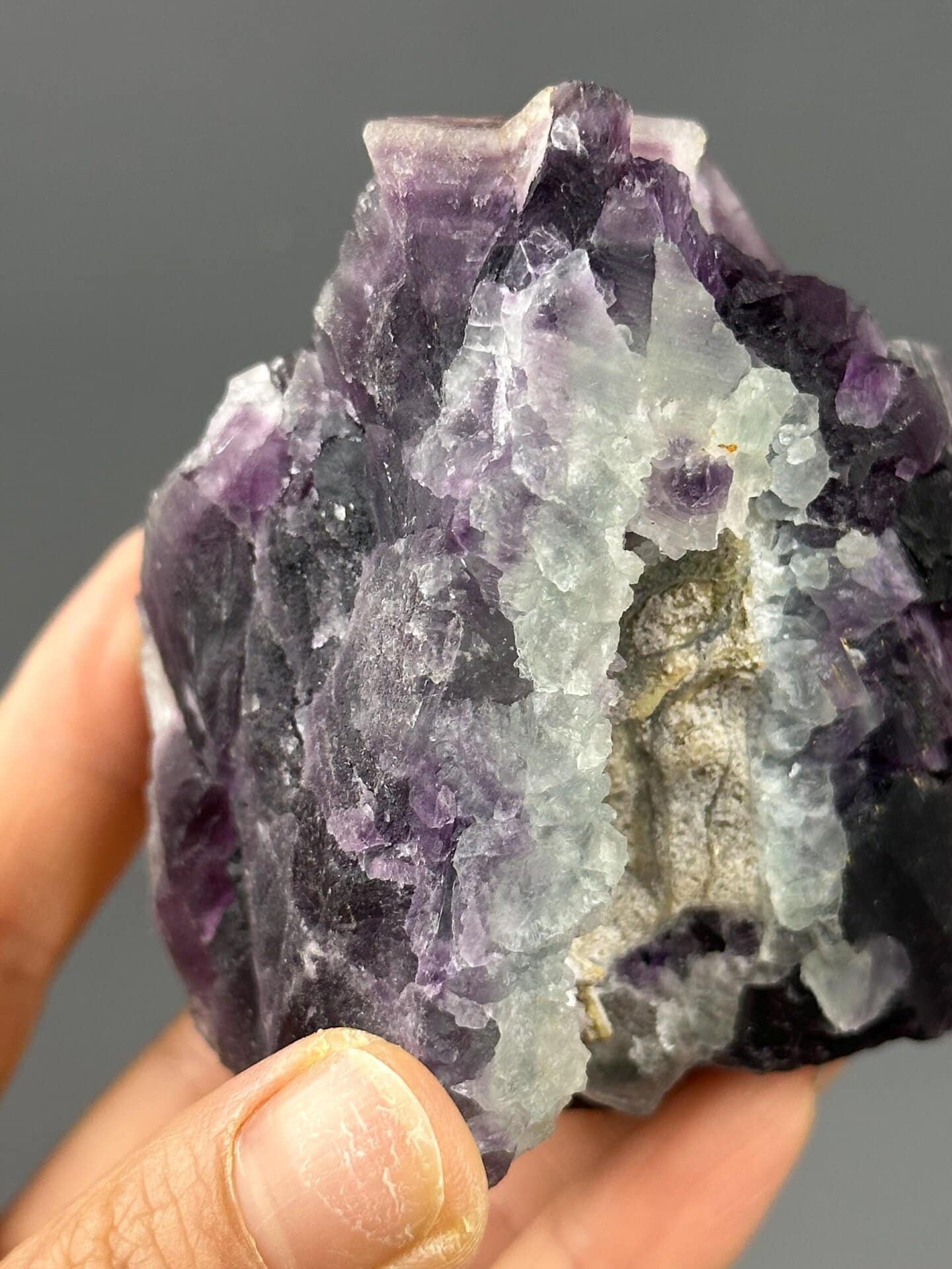 Purple exterior of triangular fluorite from Guizhou