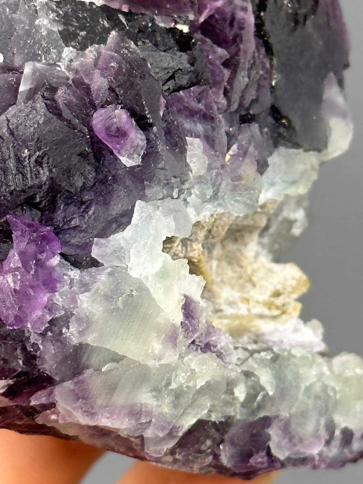 Green core detail in triangular fluorite crystal