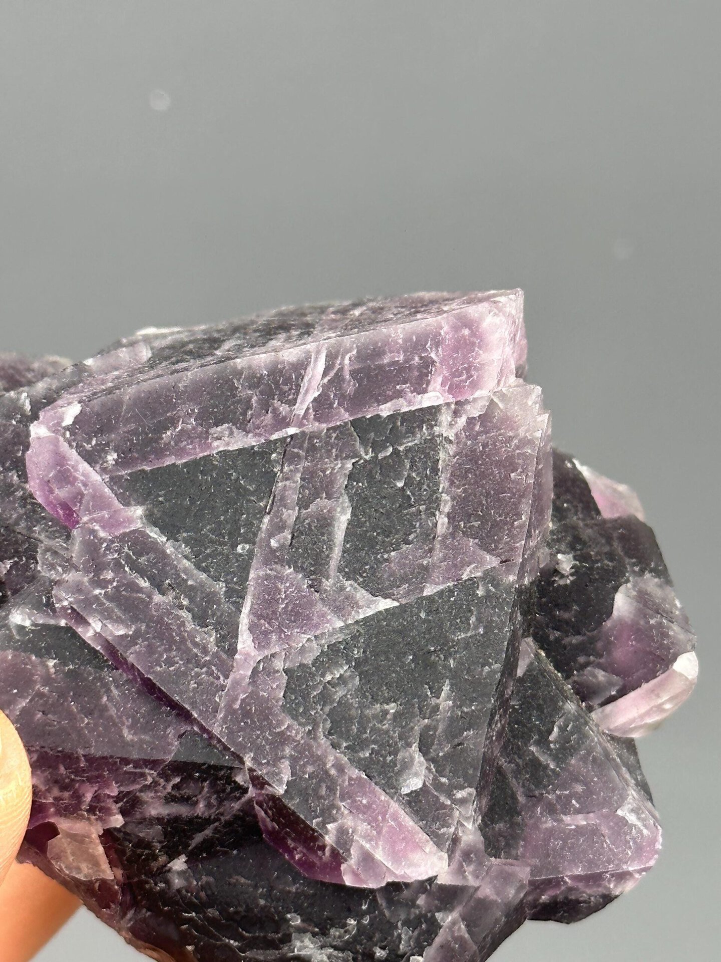 Triangular fluorite with purple exterior and green core Guizhou