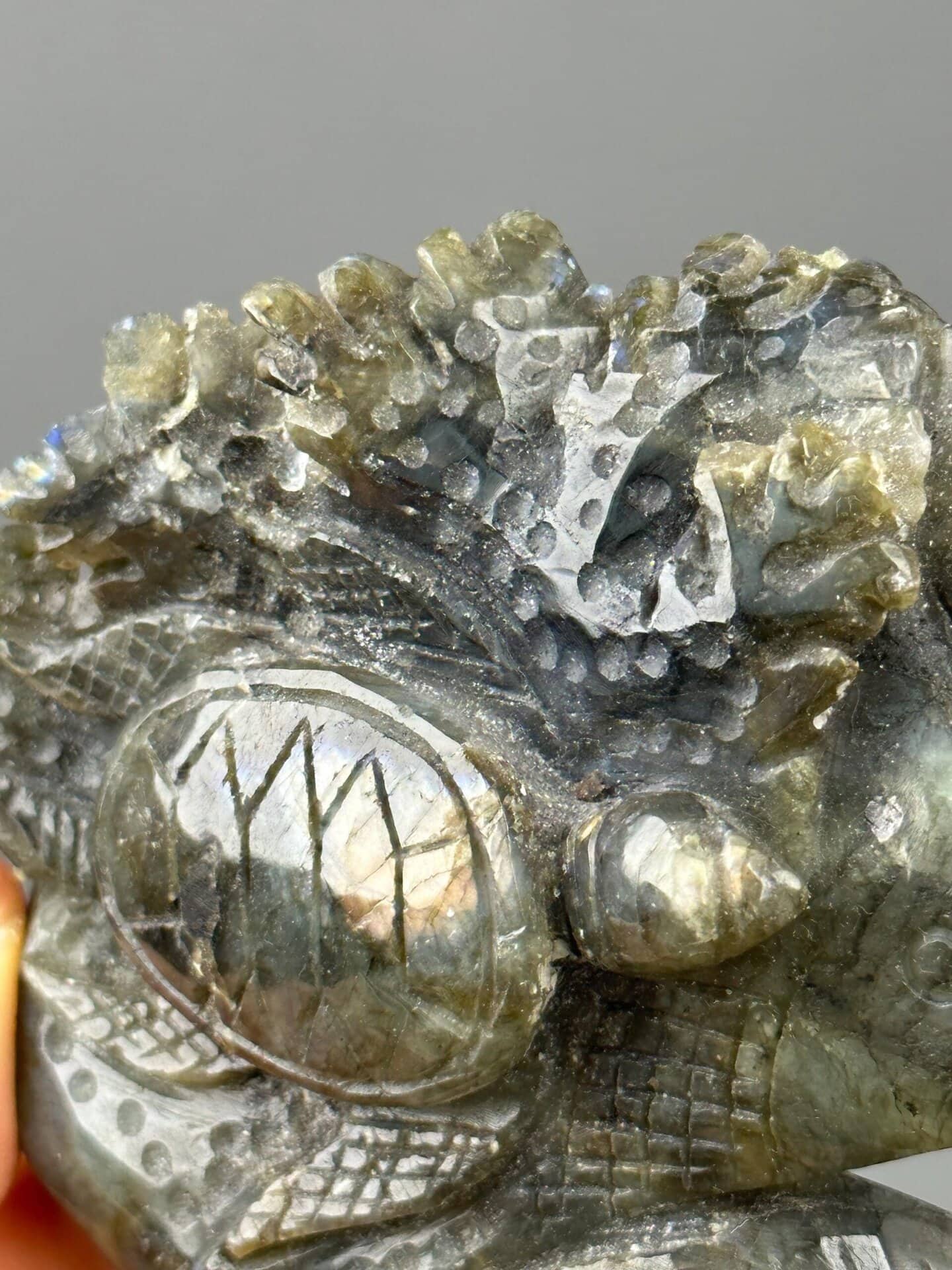Ocean wave engraving carved labradorite close-up