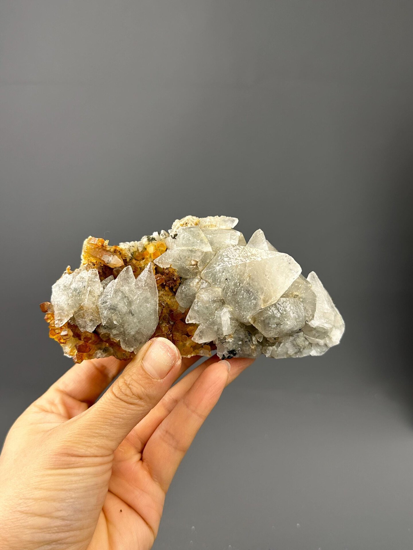 Angled view of fluorescent pink needle calcite