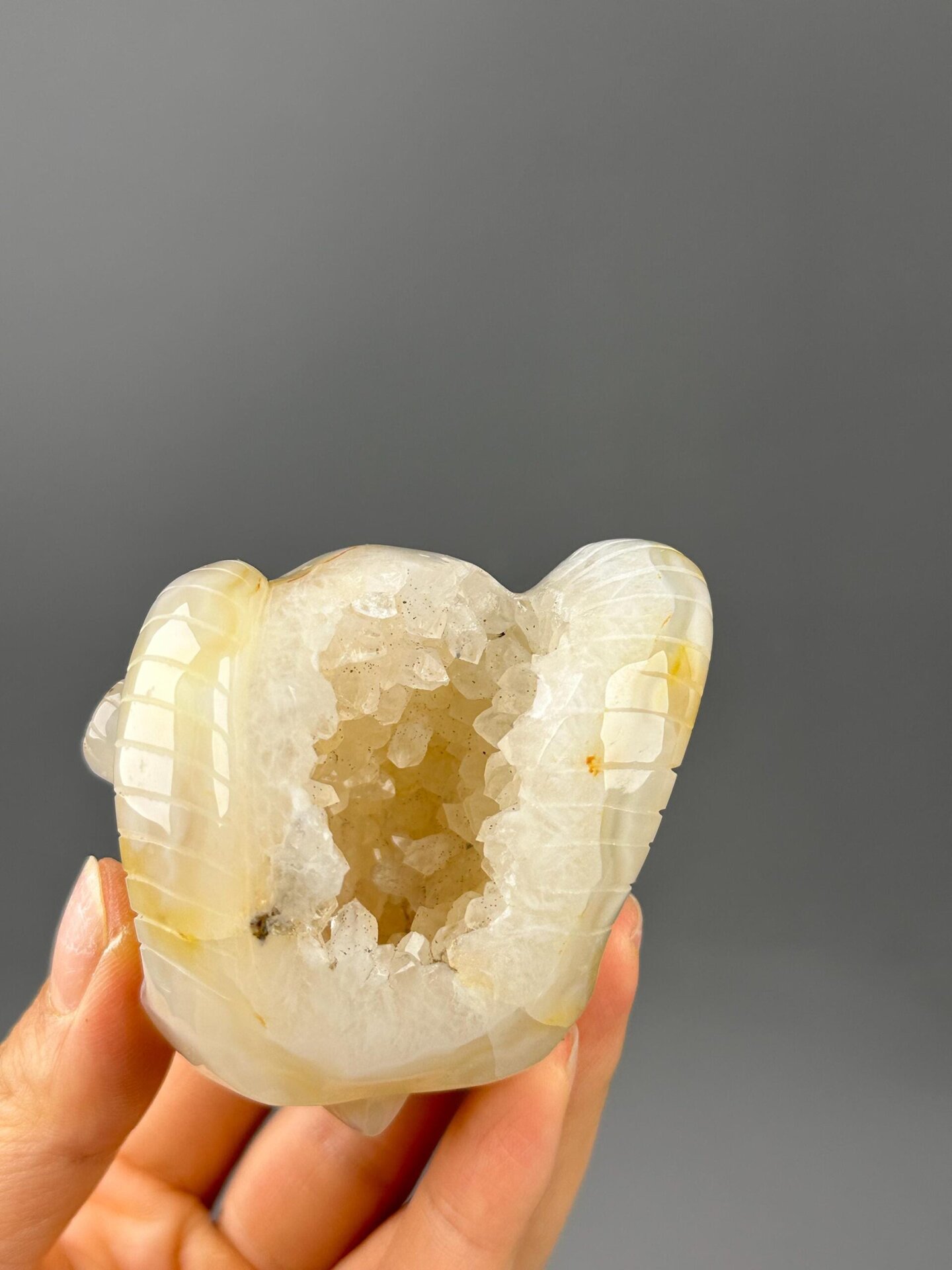 Front view of carved agate skull showing eye sockets
