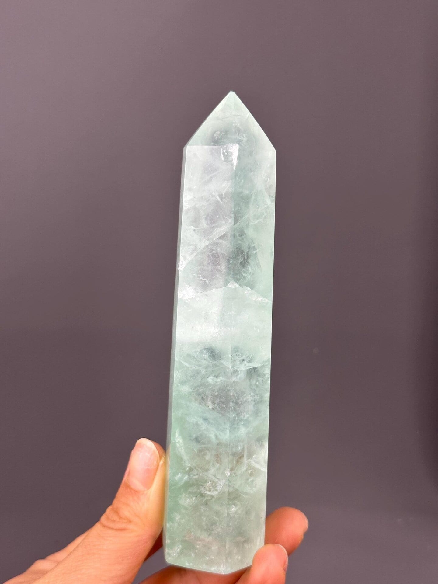 Close-up of green fluorite tower polished surface