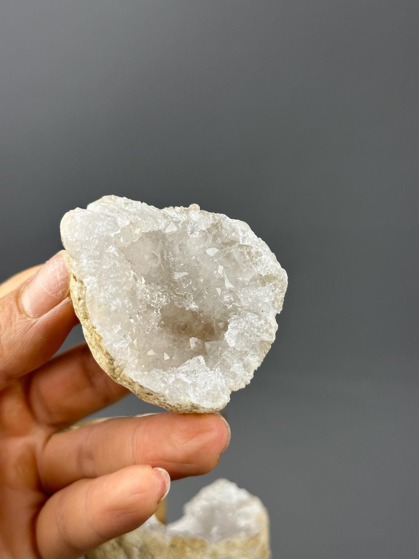Full front view of quartz geode display specimen