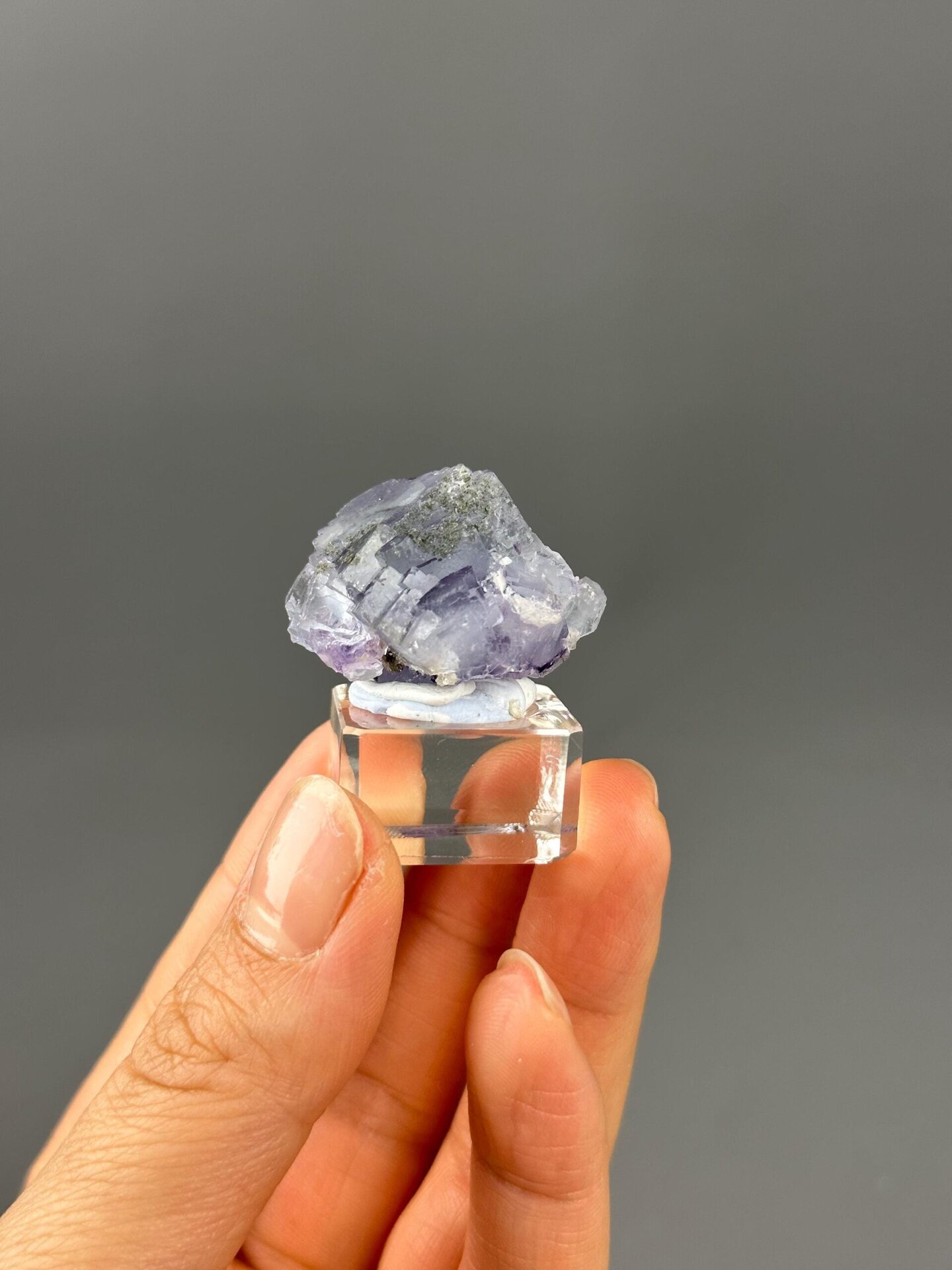 Rainbow iridescence inside fluorite crystal detail