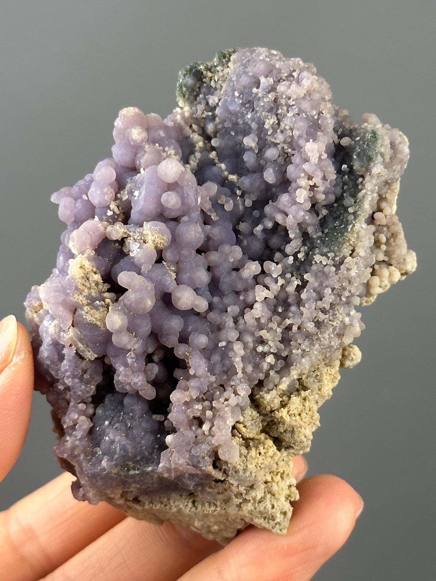 Back view of grape agate cluster base