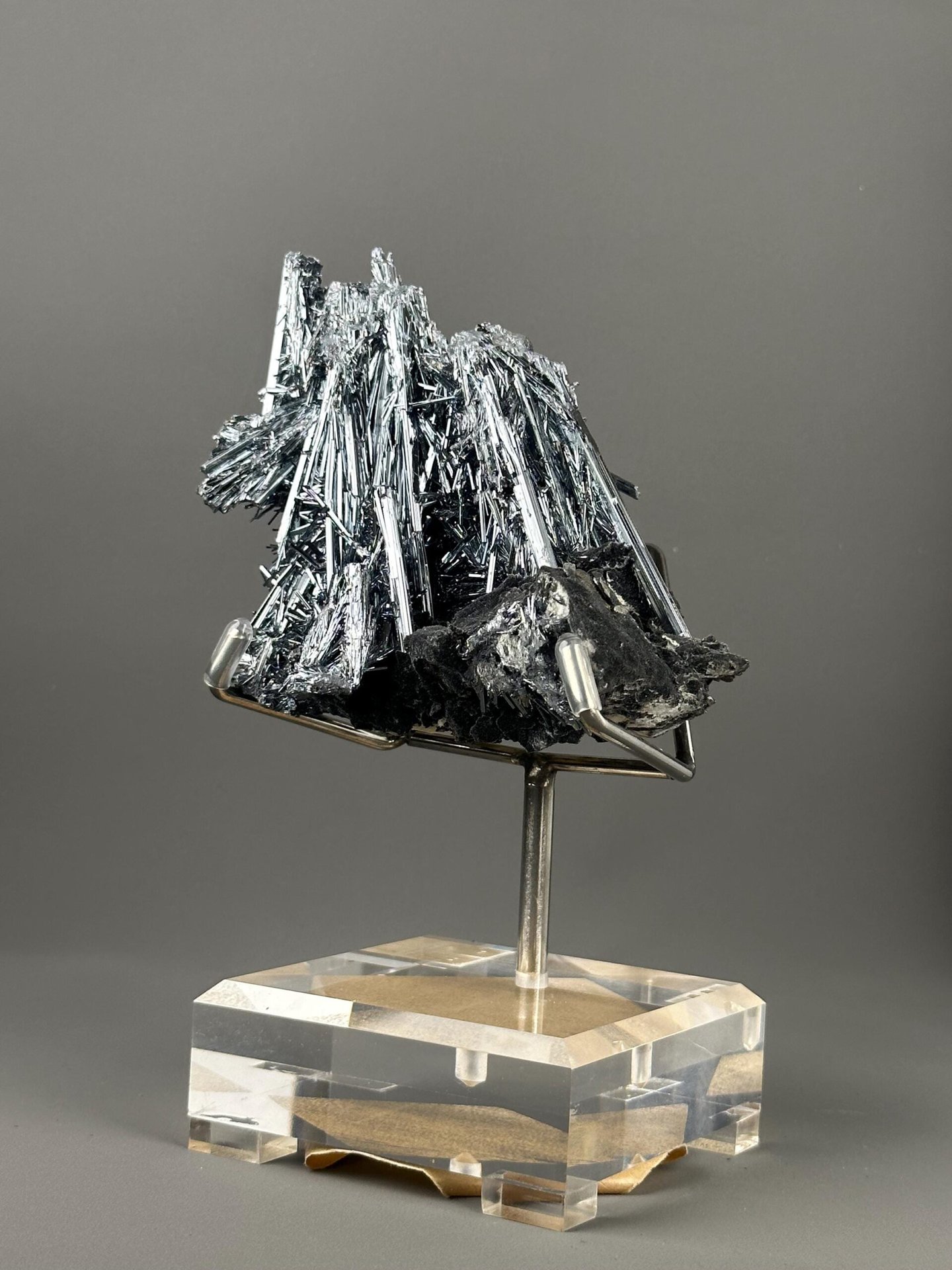 Dense interlocking stibnite needles with metallic sheen