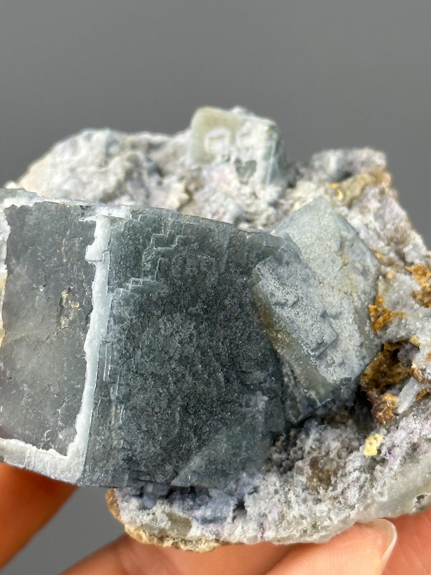 Full green fluorite cluster on white background