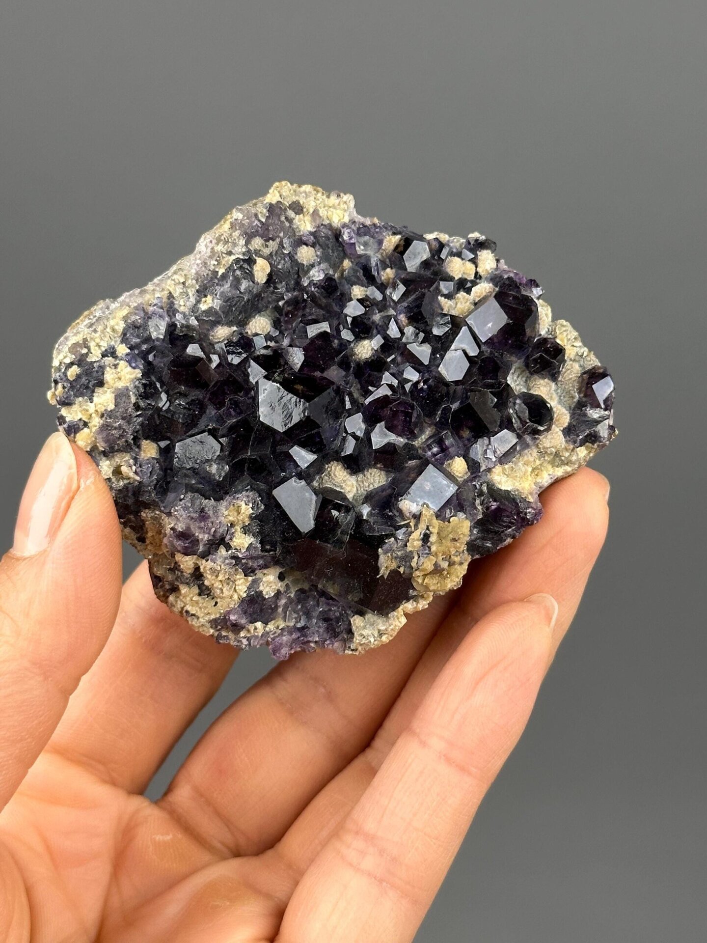 Deep purple fluorite crystal cluster China front view